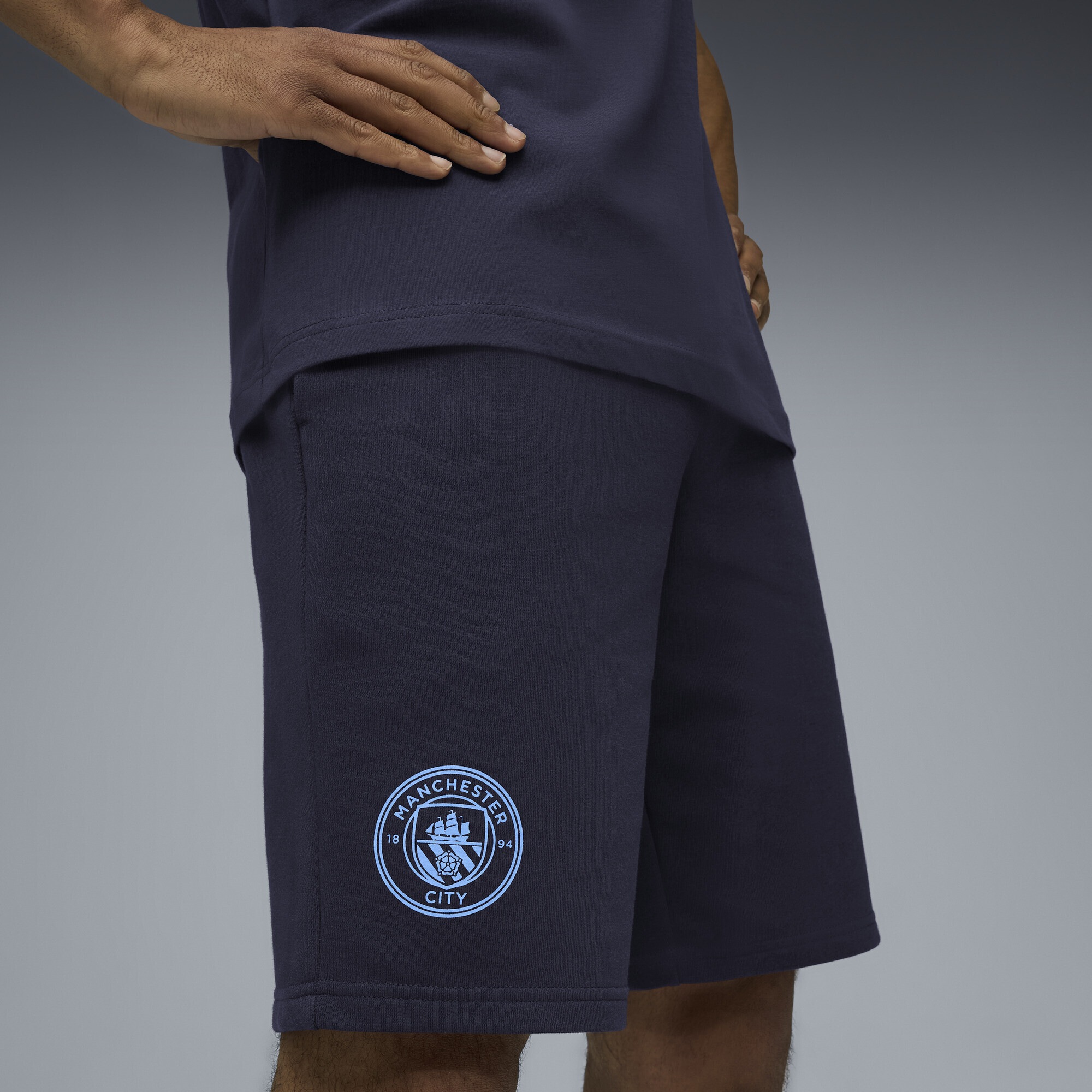 PUMA Sporthose »Manchester City FtblEssentials Shorts Herren«