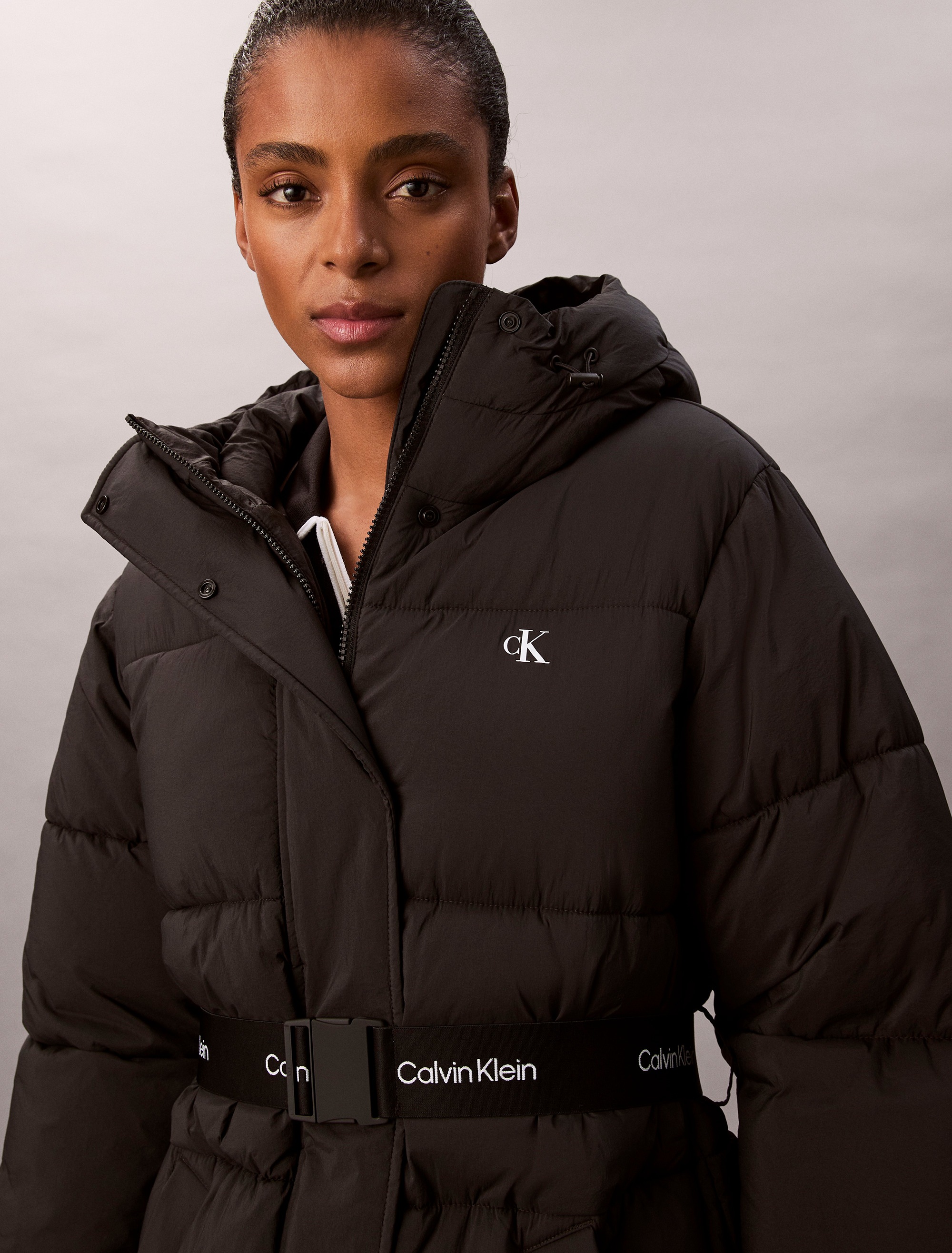 Calvin Klein Jeans Steppjacke »BELTED MIDWEIGHT PUFFER«, mit Kapuze, Mit Rundhalsausschnitt, regular fit