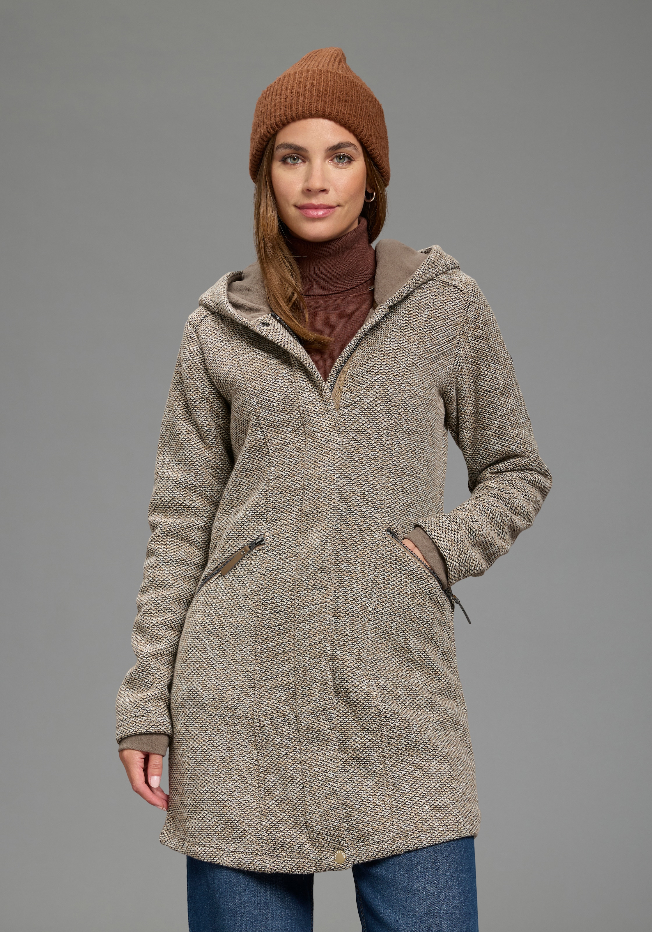 Polarino Strickmantel atmungsaktiv und wärmeisolierend. Strickoptik außen, Fleece innen.