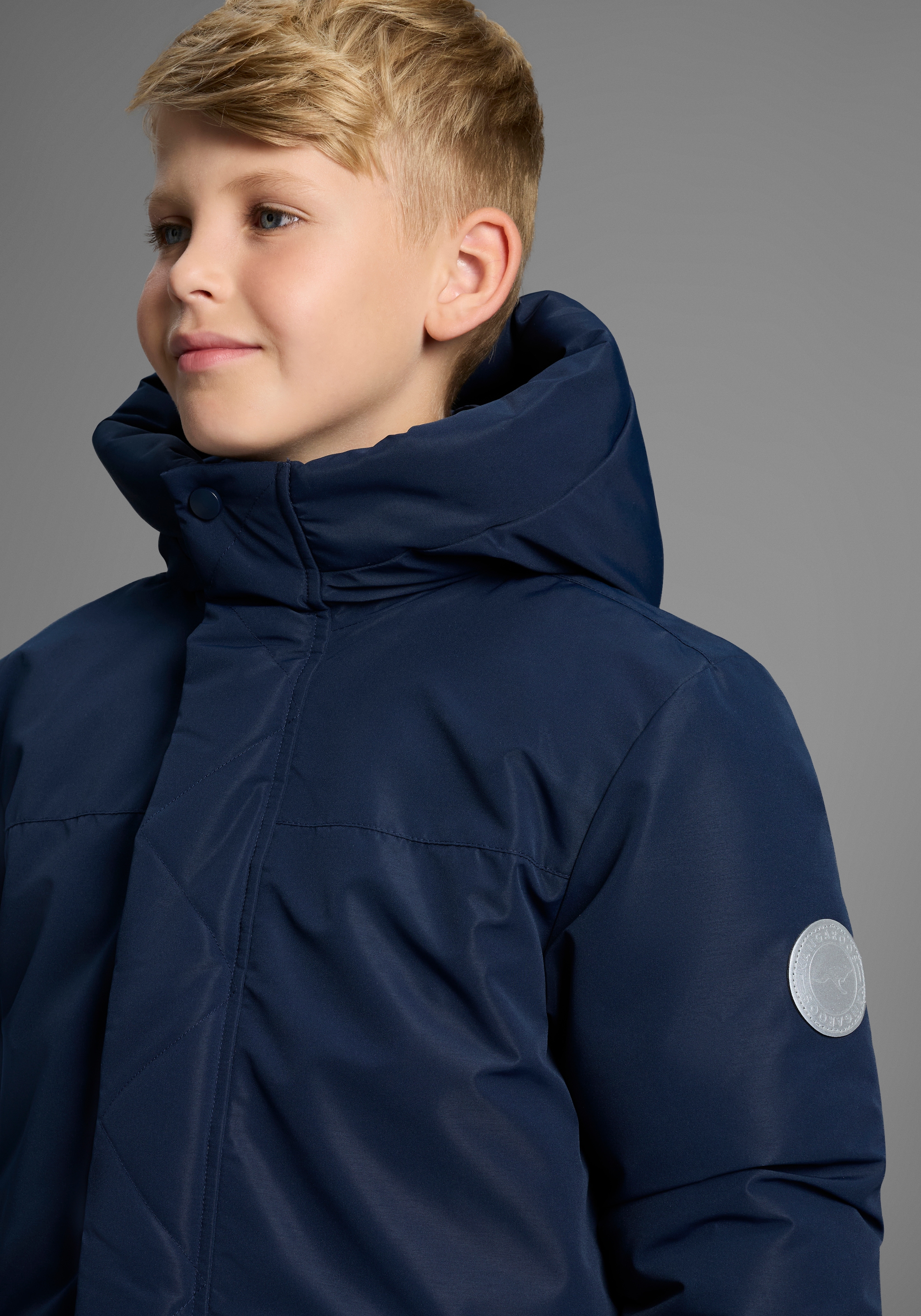 KangaROOS Outdoorjacke »Winterwarme Jacke«, mit Kapuze, Lange Winterjacke mit reflektierenden Details