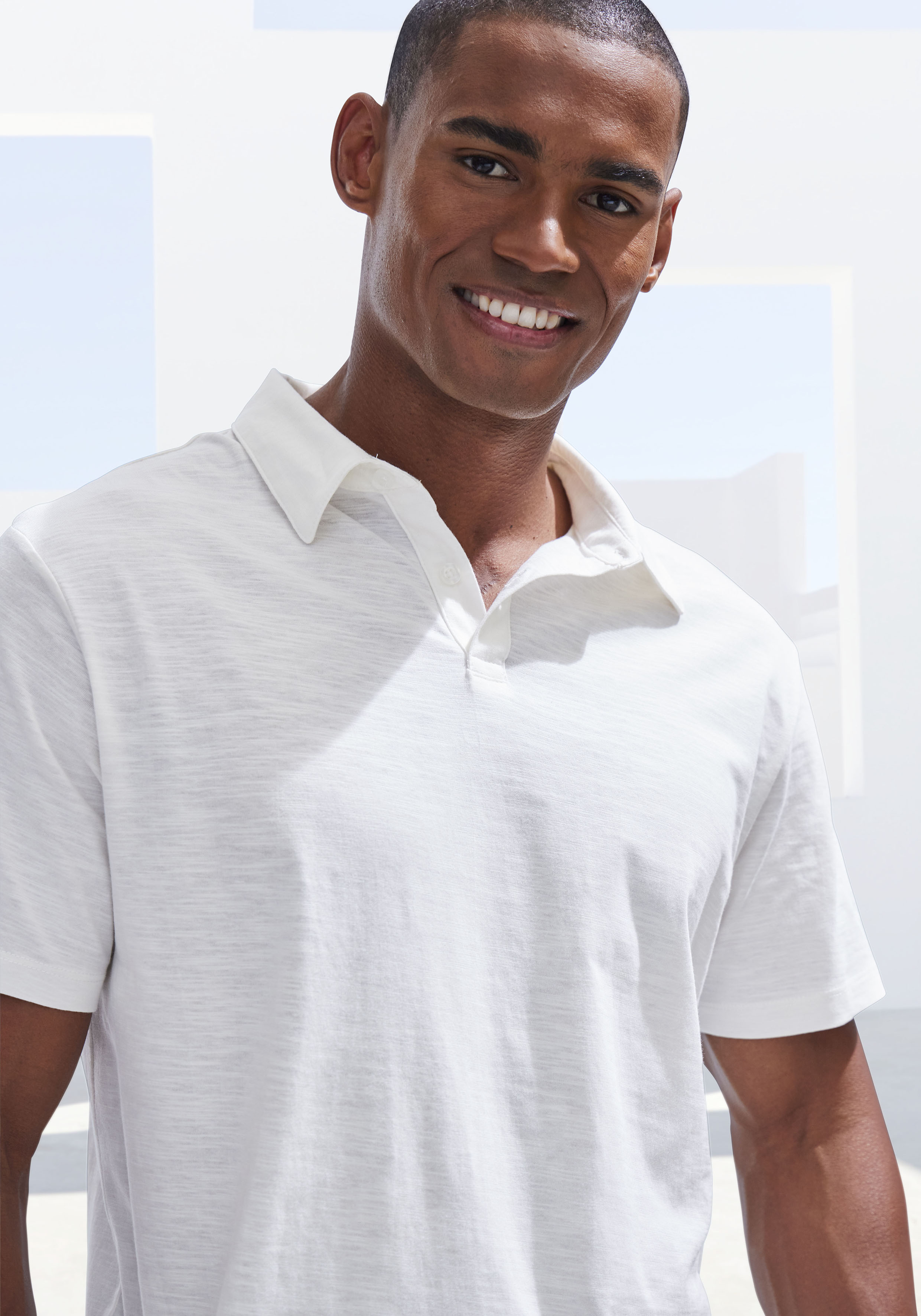 Thumbnail - John Devin Poloshirt "mit Slub-Garn Struktur" aus leichter, strukturierter Baumwollqualität