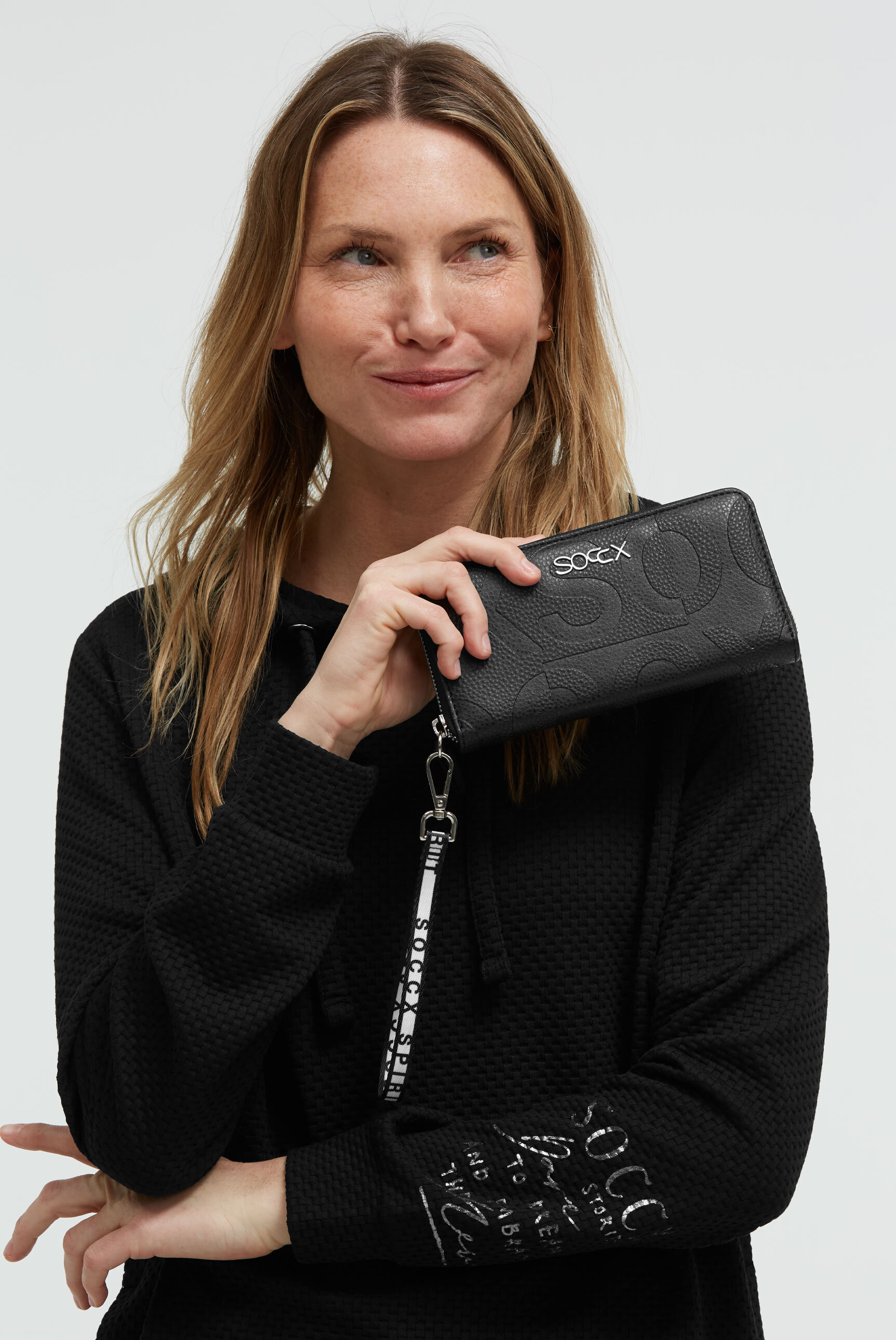 SOCCX Geldbörse Handschlaufe