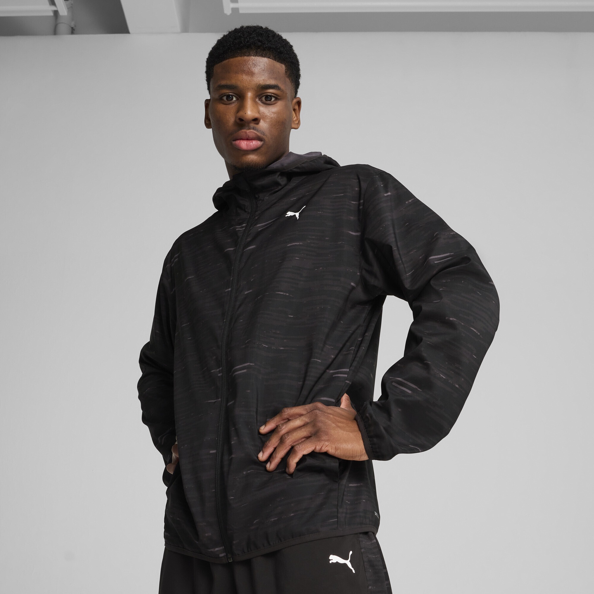 PUMA Trainingsjacke »TAD ESSENTIALS AOP Gewebte Jacke Herren«