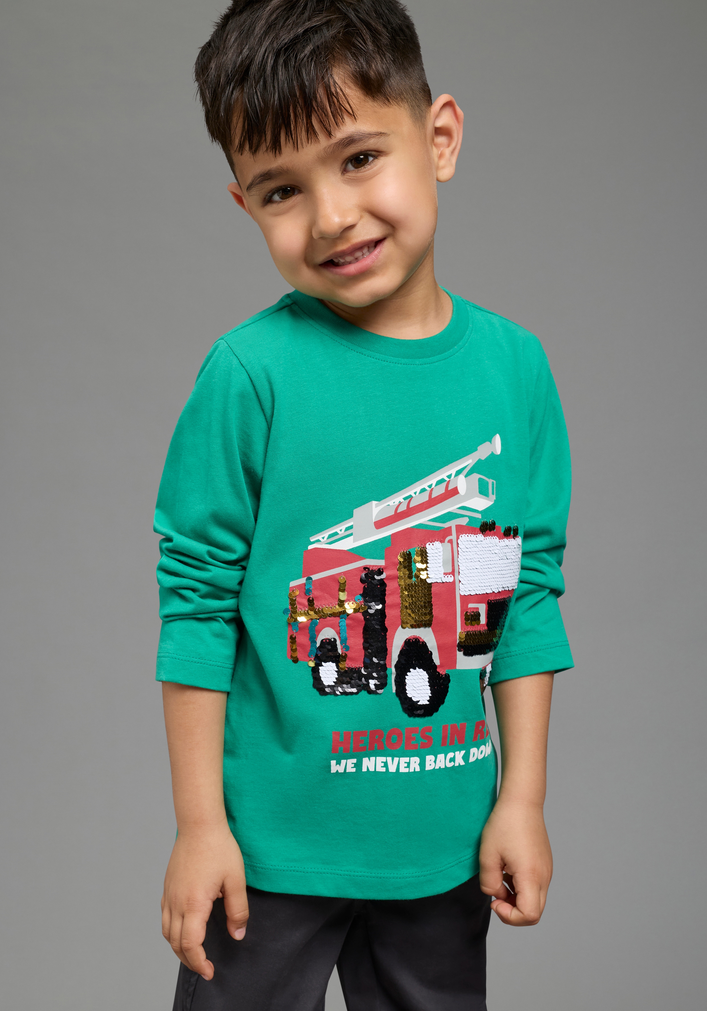 KIDSWORLD Langarmshirt "Feuerwehr Pailletten Shirt" Shirt mit Feuerwehr Wende-Pailletten