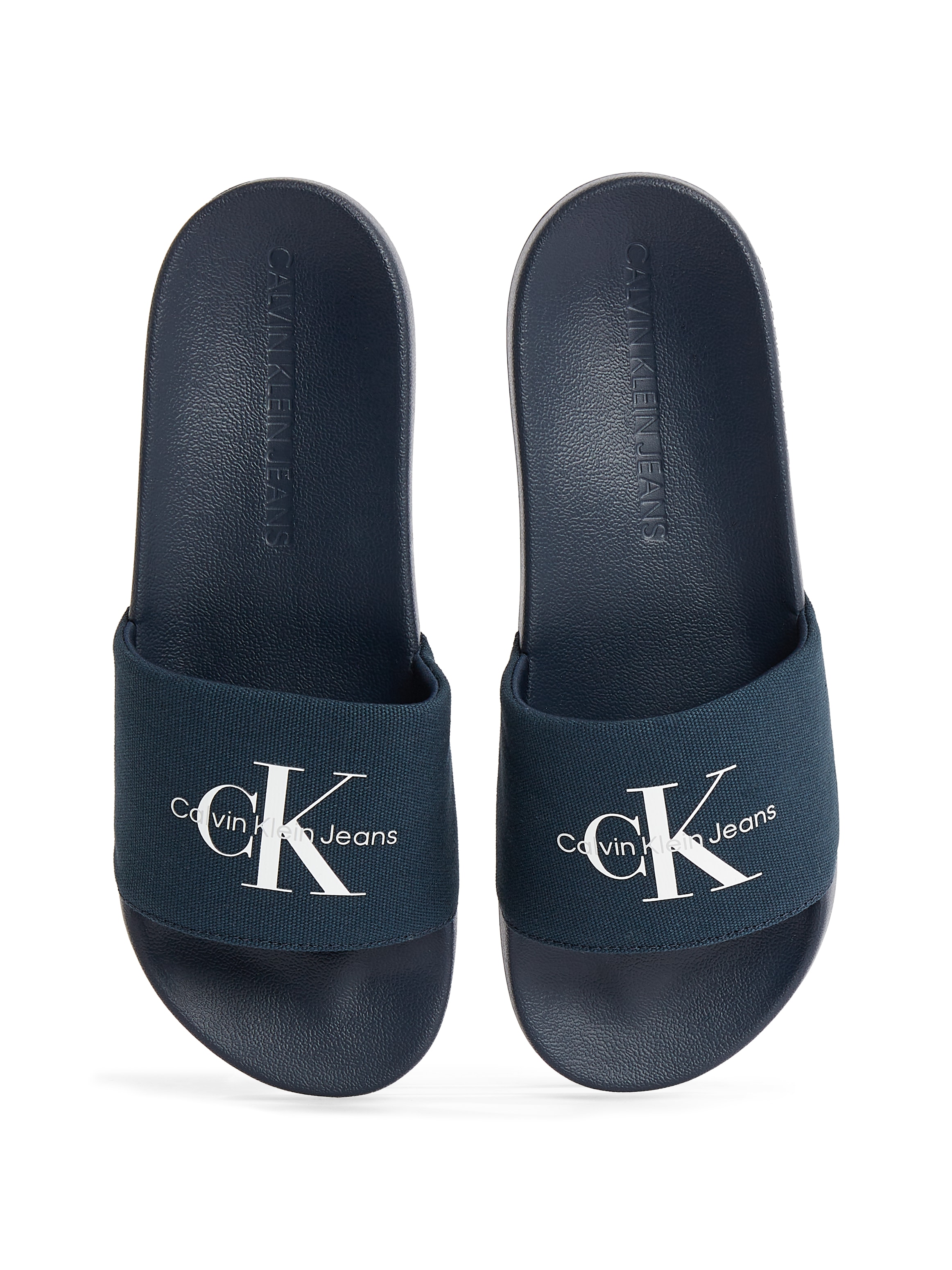 Calvin Klein Jeans Badepantolette »SLIDE MONOGRAM«, Sommerschuh, Schlappen, Poolslides, Strandschuh mit Logoschriftzug