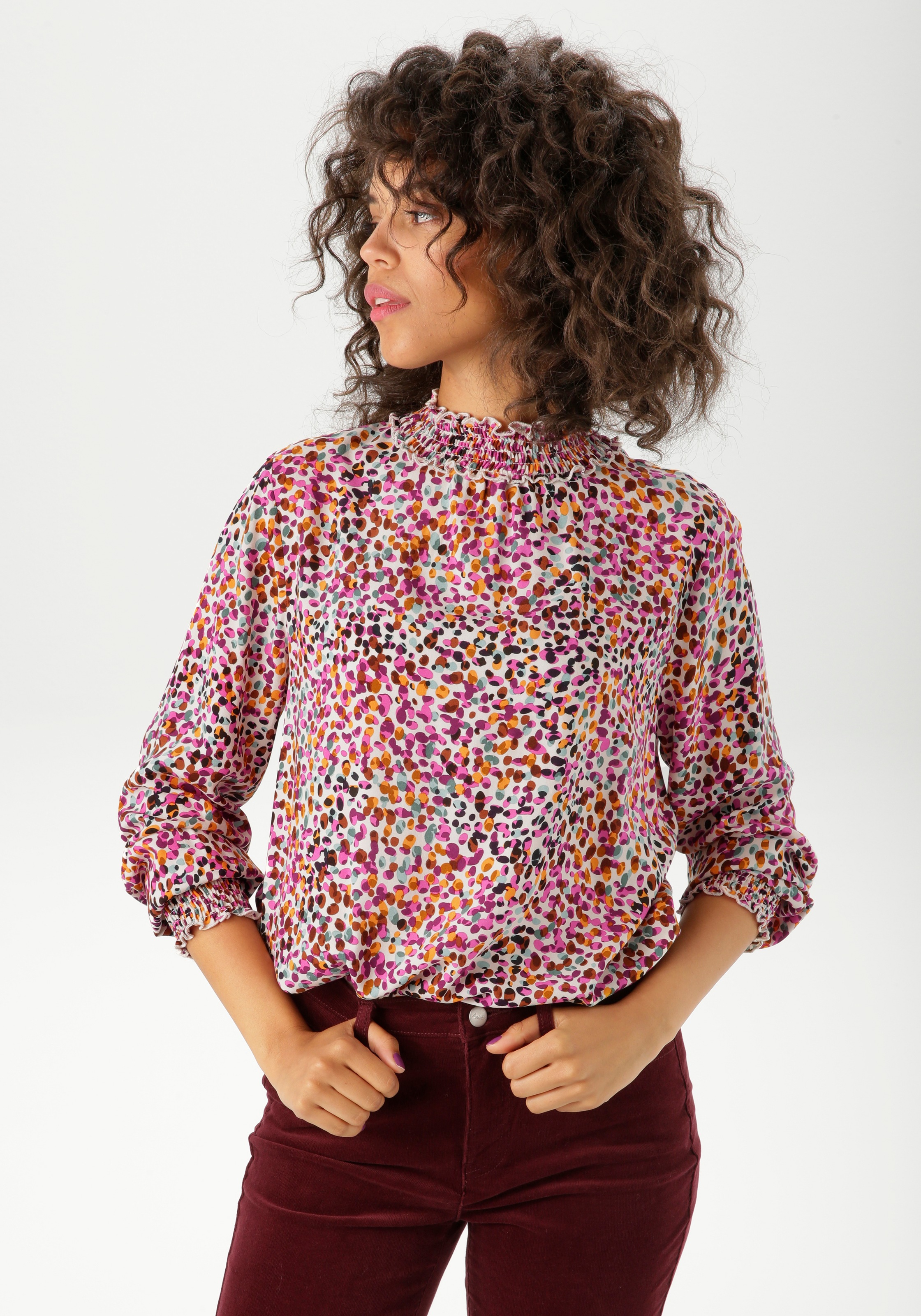 Aniston CASUAL Schlupfbluse mit farbharmonischen Tupfen bedruckt günstig online kaufen