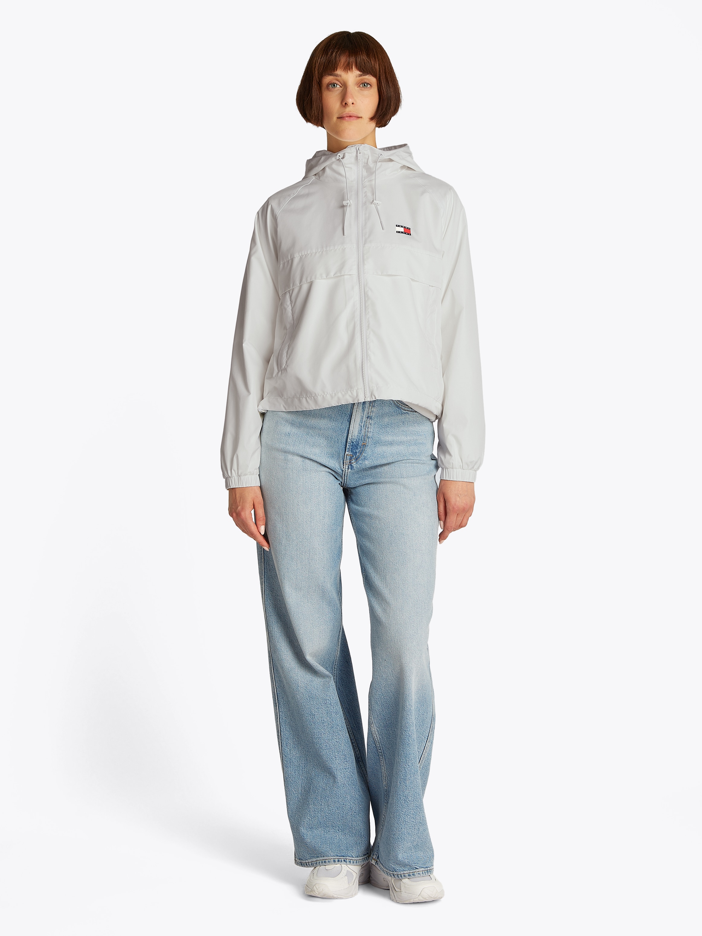 Tommy Jeans Windbreaker »TJW ESSENTIAL WINDBREAKER EXT«, mit Kapuze, mit Logodruck