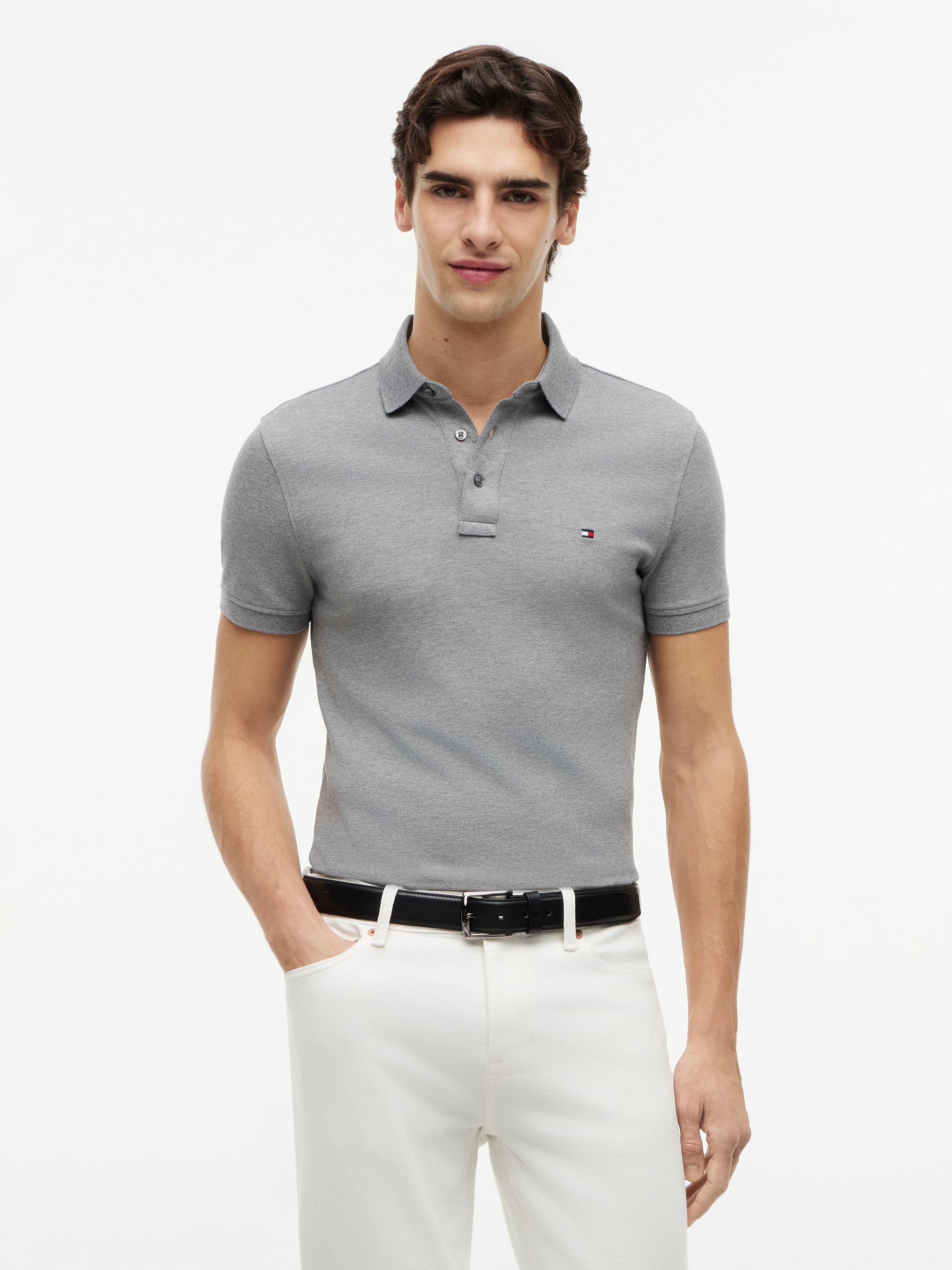 Tommy Hilfiger Poloshirt "1985 SLIM POLO mit Piqué-Struktur und Stickerei" meliert, casual, slim fit, Baumwollmix, Polokragen