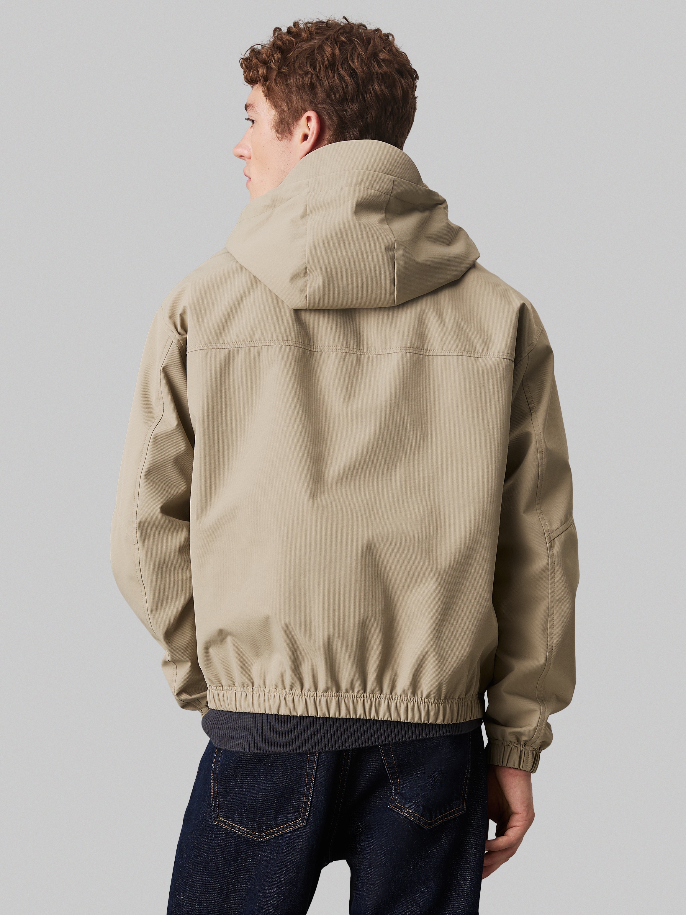 Calvin Klein Jeans Allwetterjacke "TECHNICAL JACKET", mit Kapuze, Logodruck günstig online kaufen