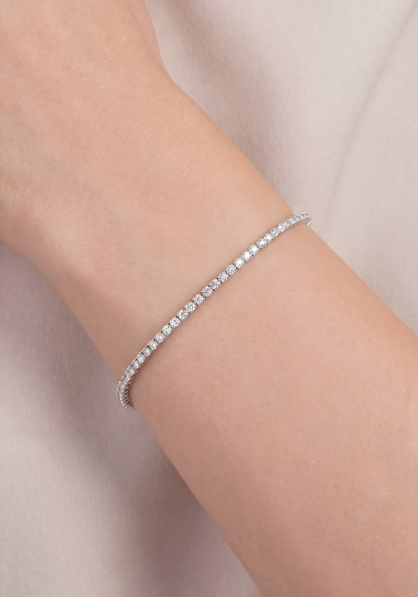 JOBO Tennisarmband »Amband mit 84 Zirkonia« 925 Silber rhodiniert oder vergoldet 16 cm