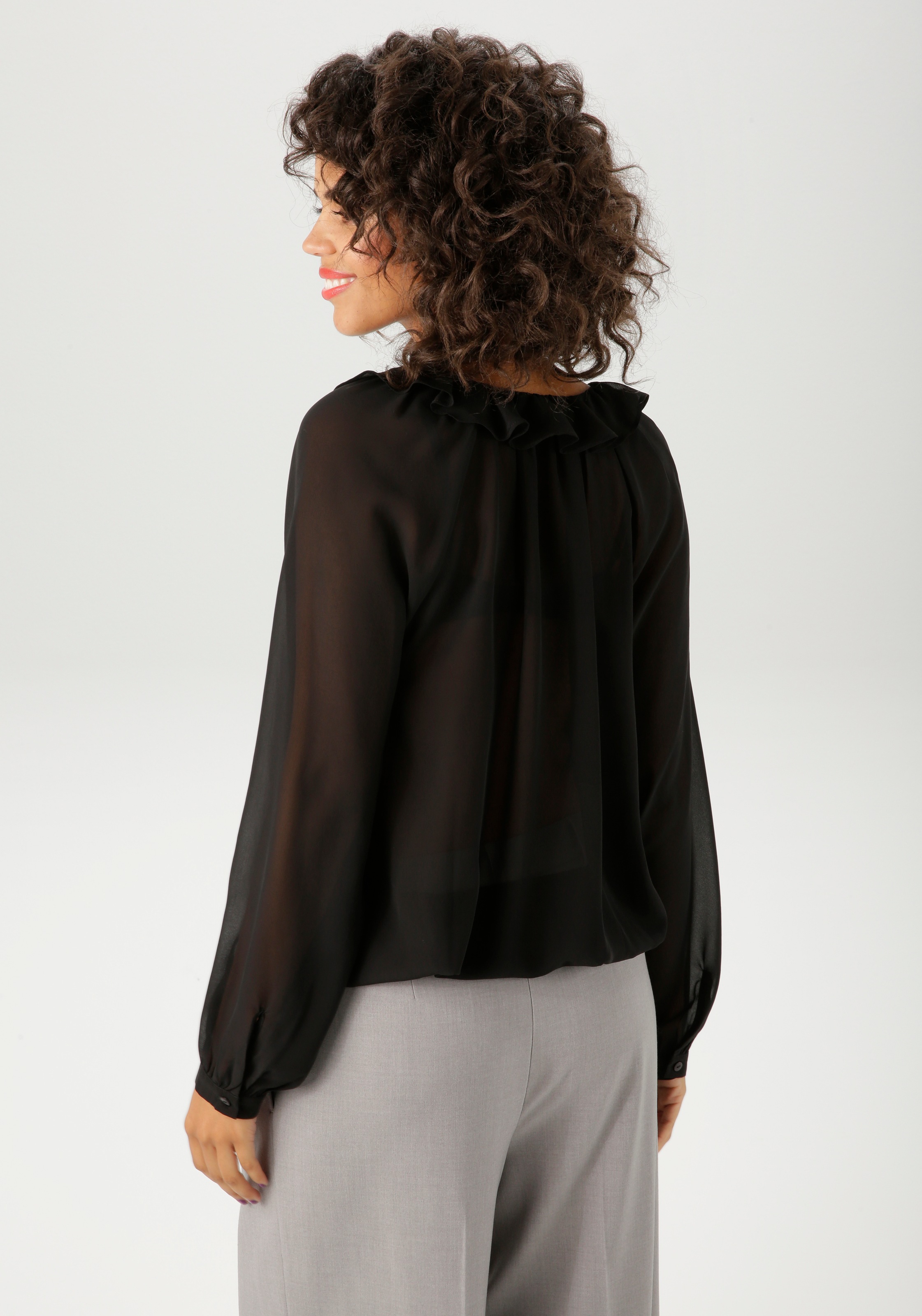 Aniston CASUAL Schlupfbluse mit Rüschen am V-Ausschnitt und im Vorderteil günstig online kaufen