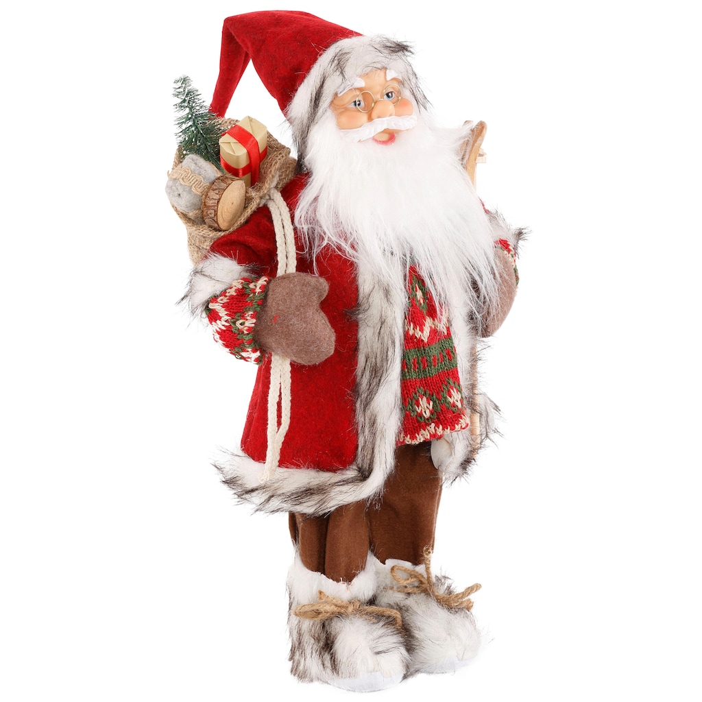 HOSSNER - HOMECOLLECTION Weihnachtsmann »Santa mit Skiern unter dem Arm und Geschenken«