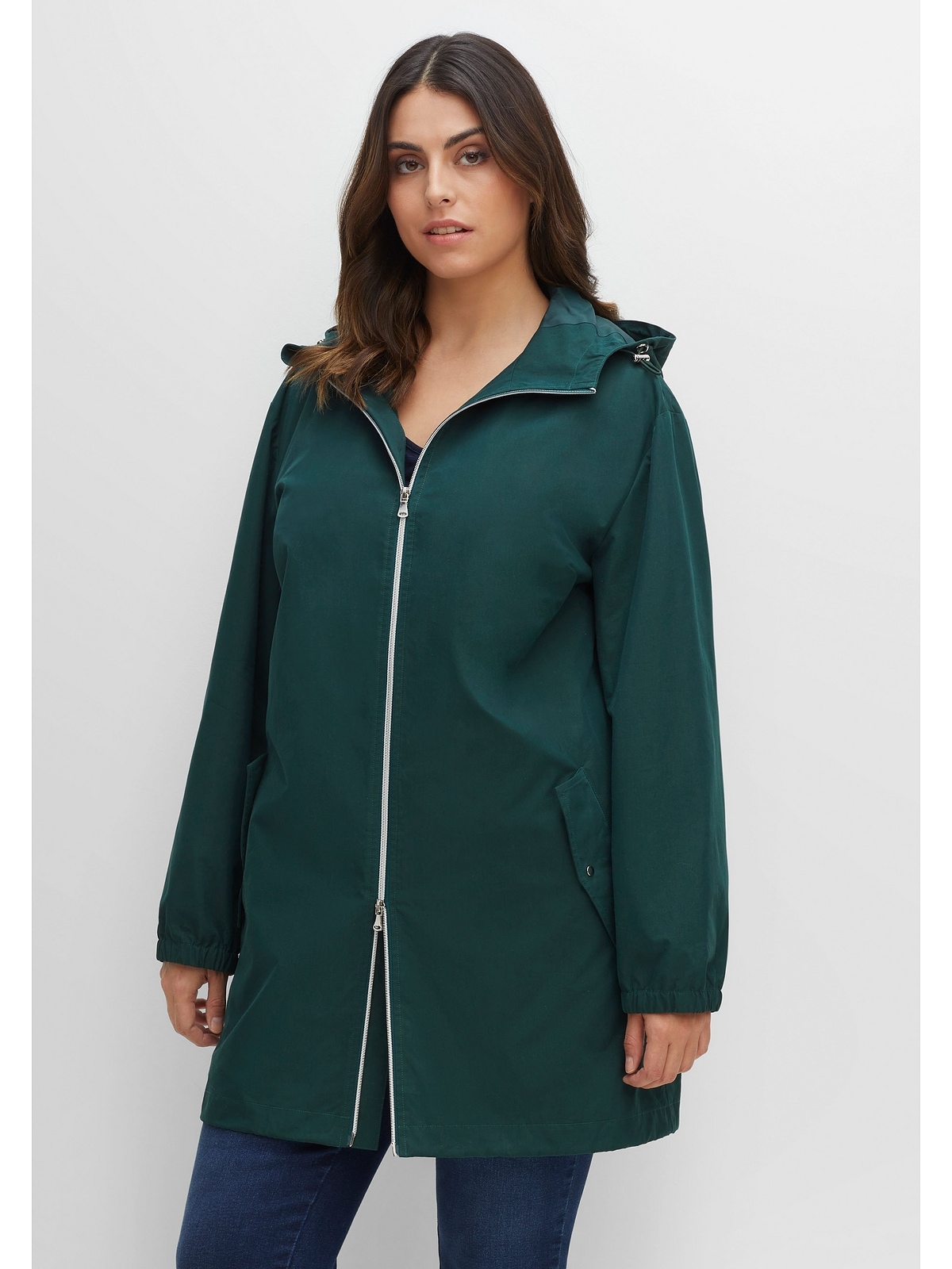 Sheego Outdoorjacke »Große Oversized- kaufen Größen«, Kapuze, mit online | Schnitt mit BAUR Kapuze, im