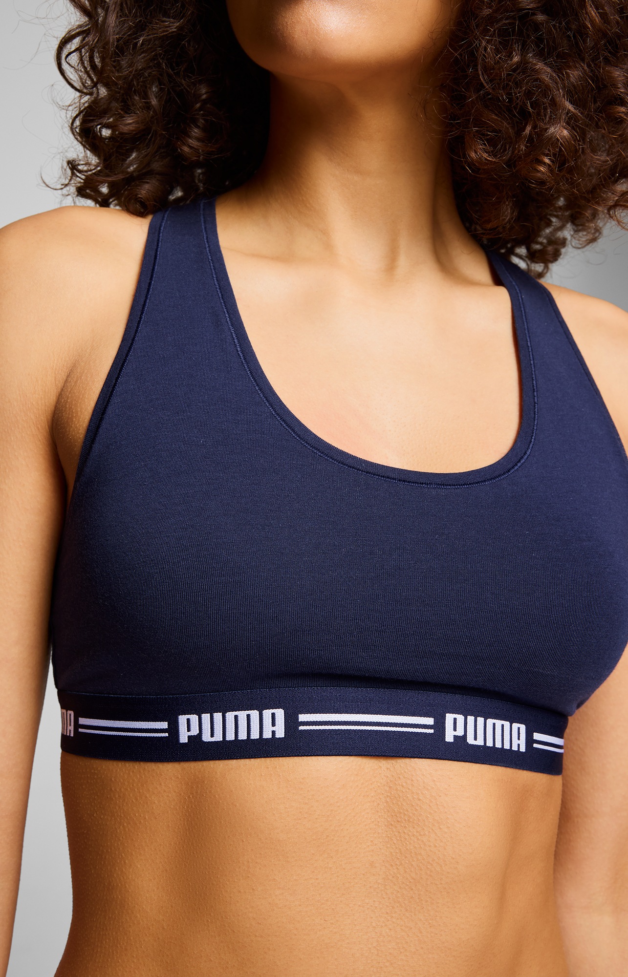 Thumbnail - PUMA Sport-Bustier "PUMA WOMEN RACER BACK TOP 1P HANG" Racerback-Rücken, Logo-Unterbrustband, ohne Bügel, elastisch