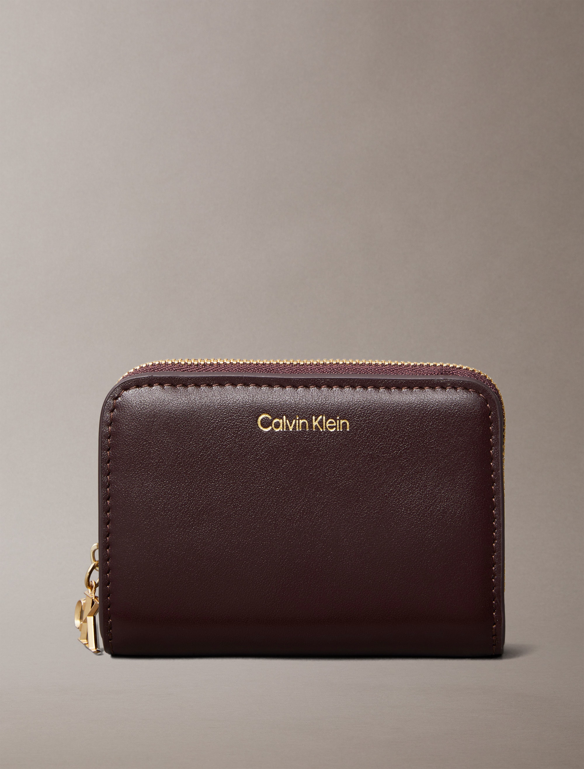 Calvin Klein Geldbörse "CK PULLER MEDIUM FLAP ZIP AROUND", Damen Geldbörse, günstig online kaufen