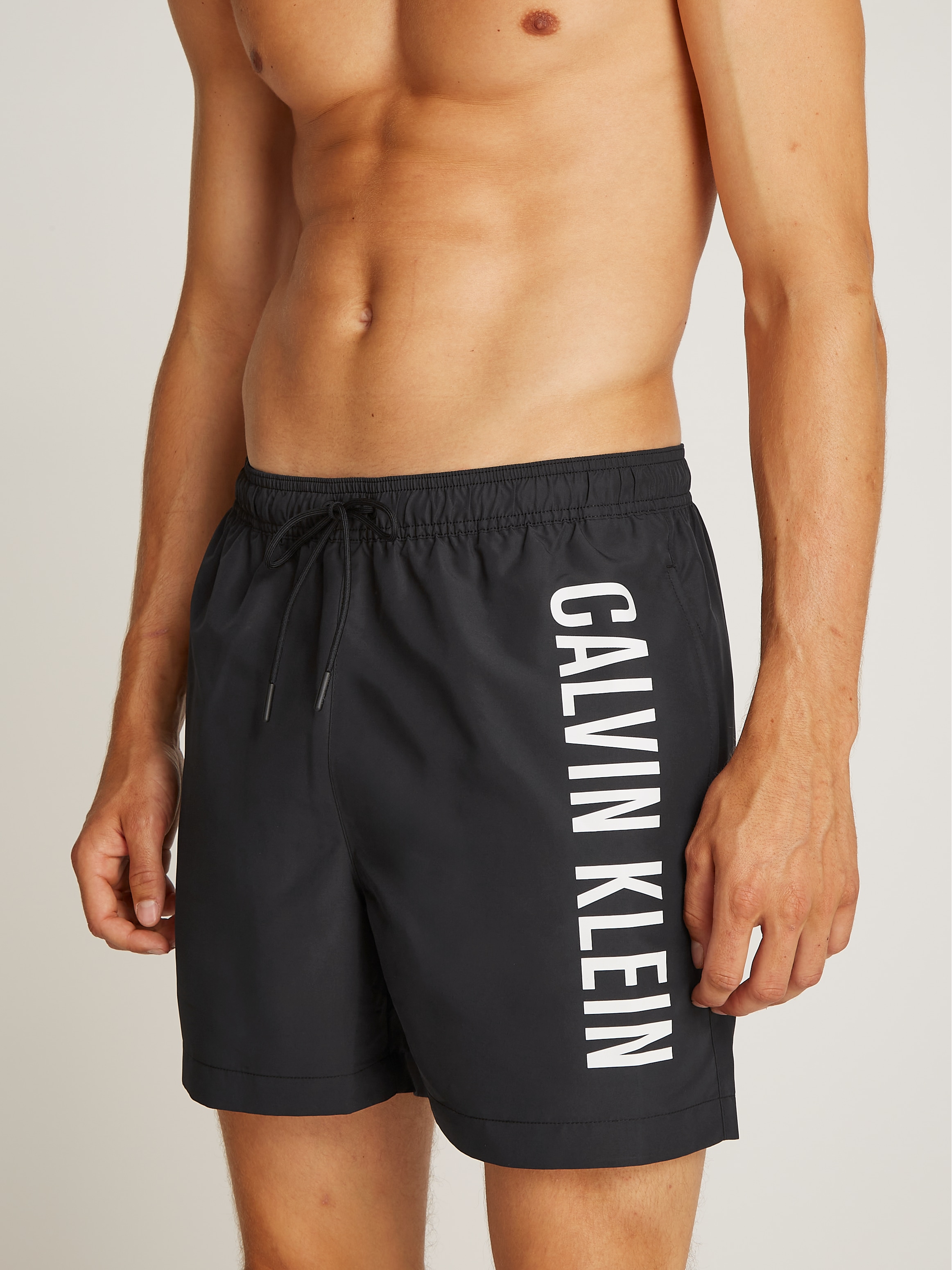 Calvin Klein Swimwear Badeshorts »MEDIUM DRAWSTRING«, mit großem Logo