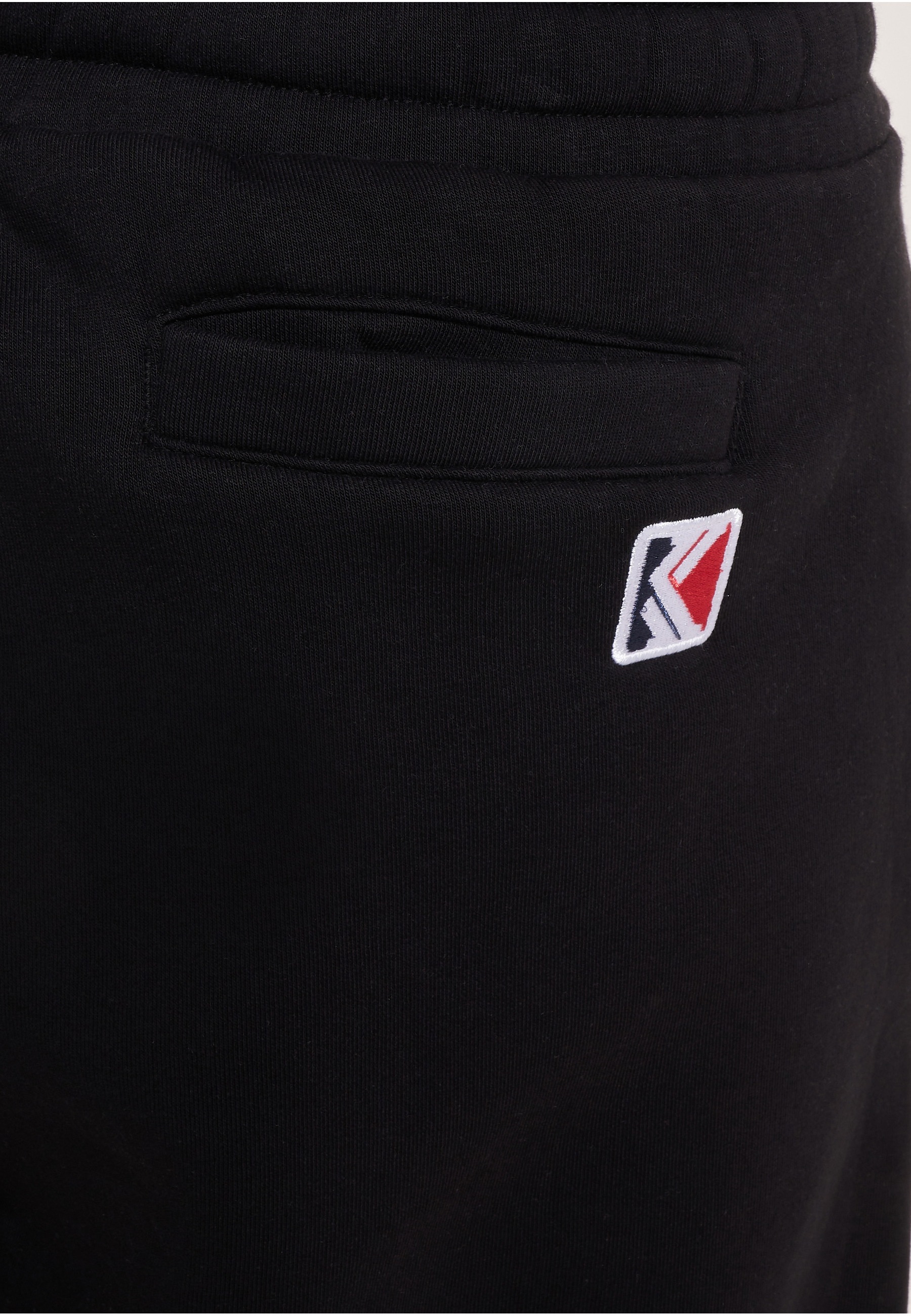 Karl Kani Stoffhose »Karl Kani Herren KKMQ12007 SIGNATURE RETRO SWEATPANTS BLK«