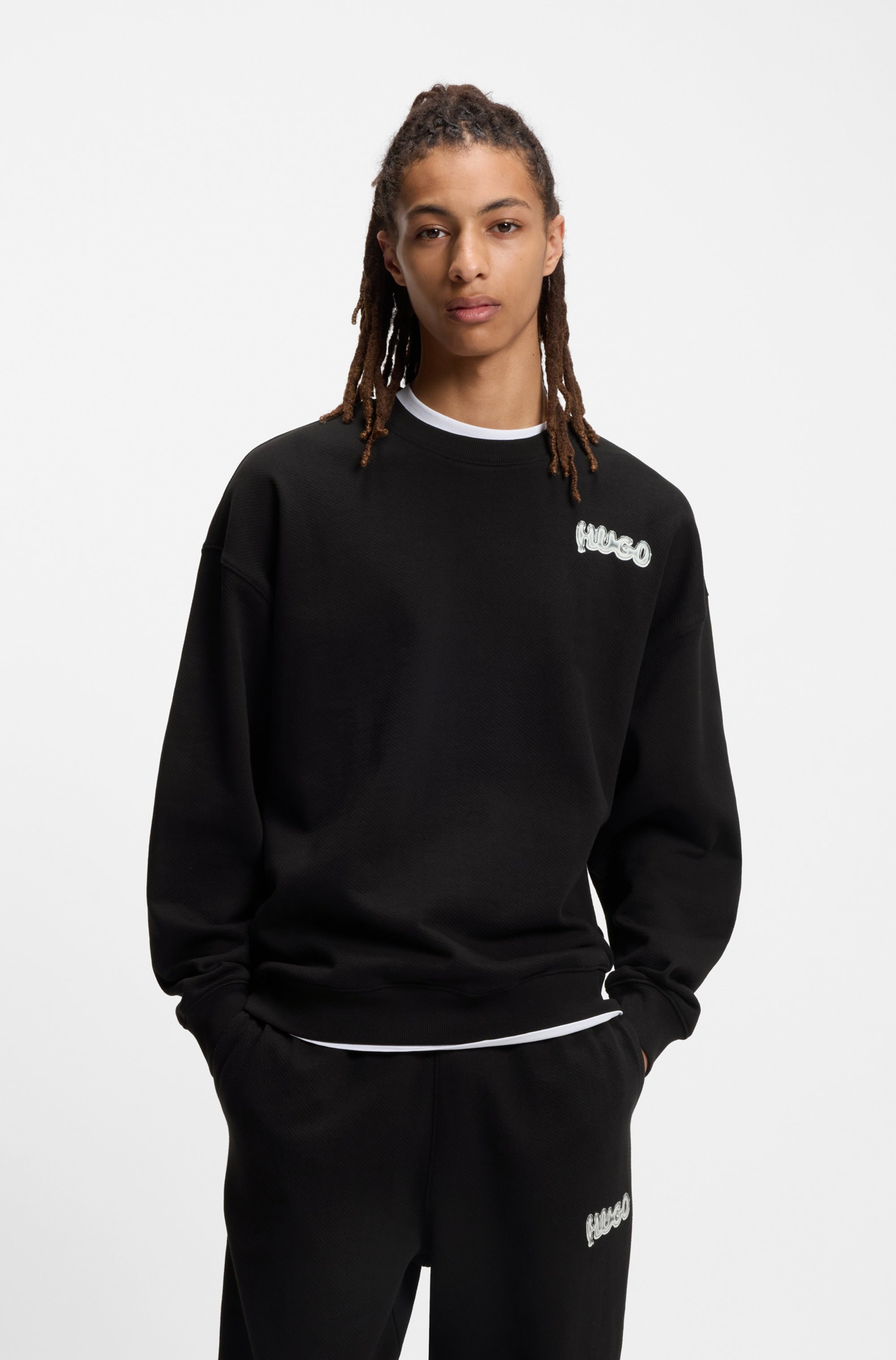 HUGO Sweatshirt "Nyrocrew", Rückenaufdruck in Chrom-Optik, Rundhalsausschnitt, Loose fit