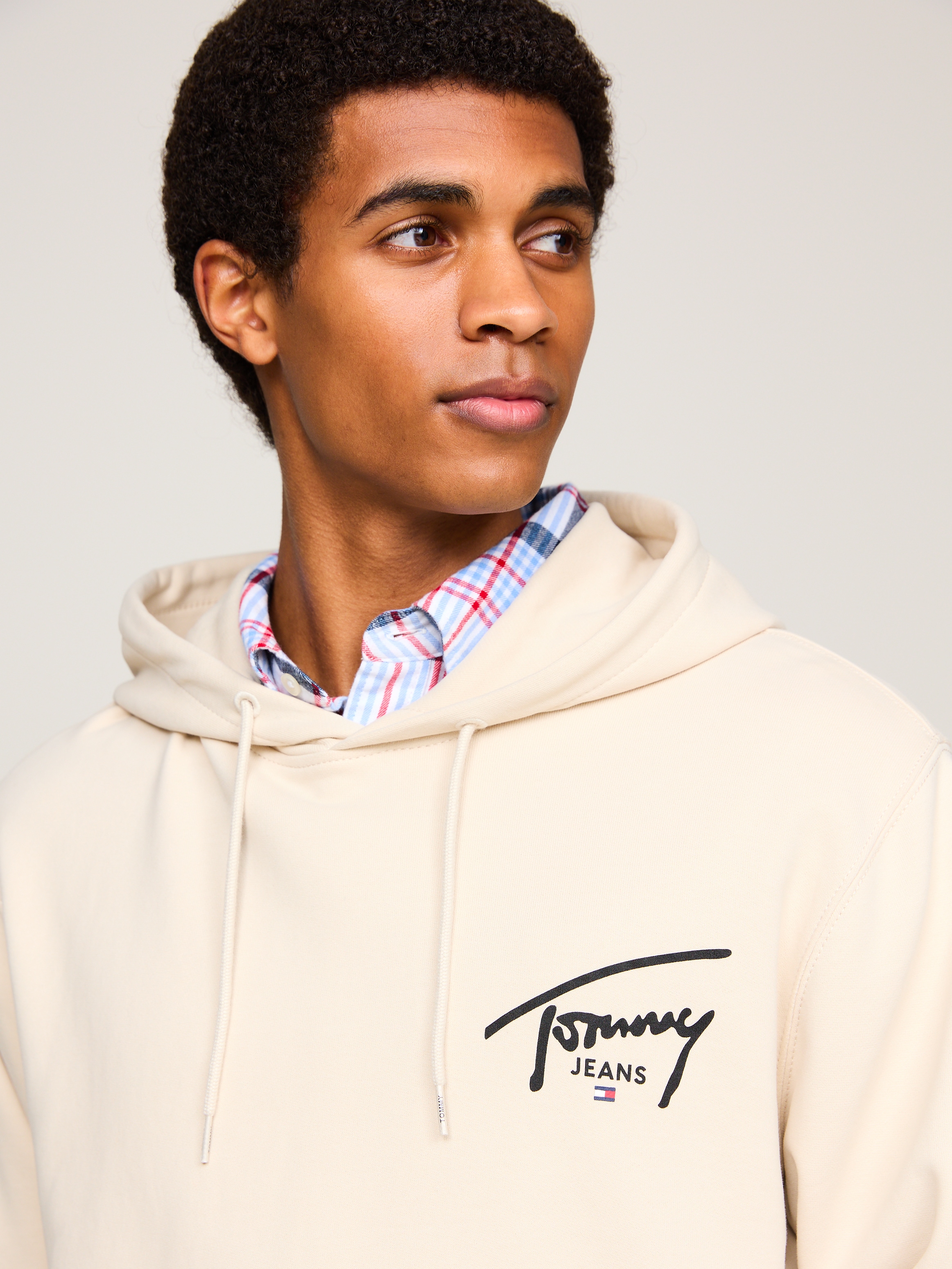 Tommy Jeans Kapuzensweatshirt »TJM REG ENTRY GRAPHIC HOODIE EXT«, mit Logoschriftzug