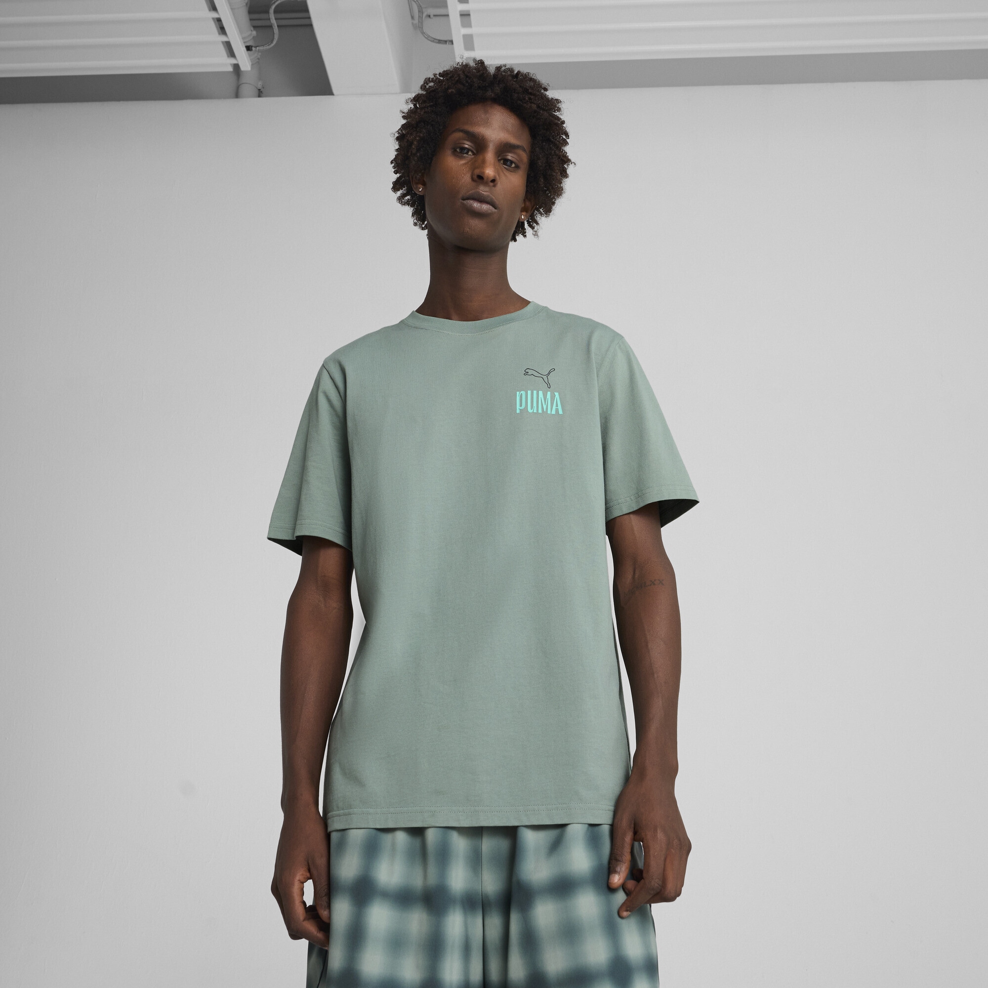 PUMA T-Shirt »Road To Unity T-Shirt mit Grafik Herren«