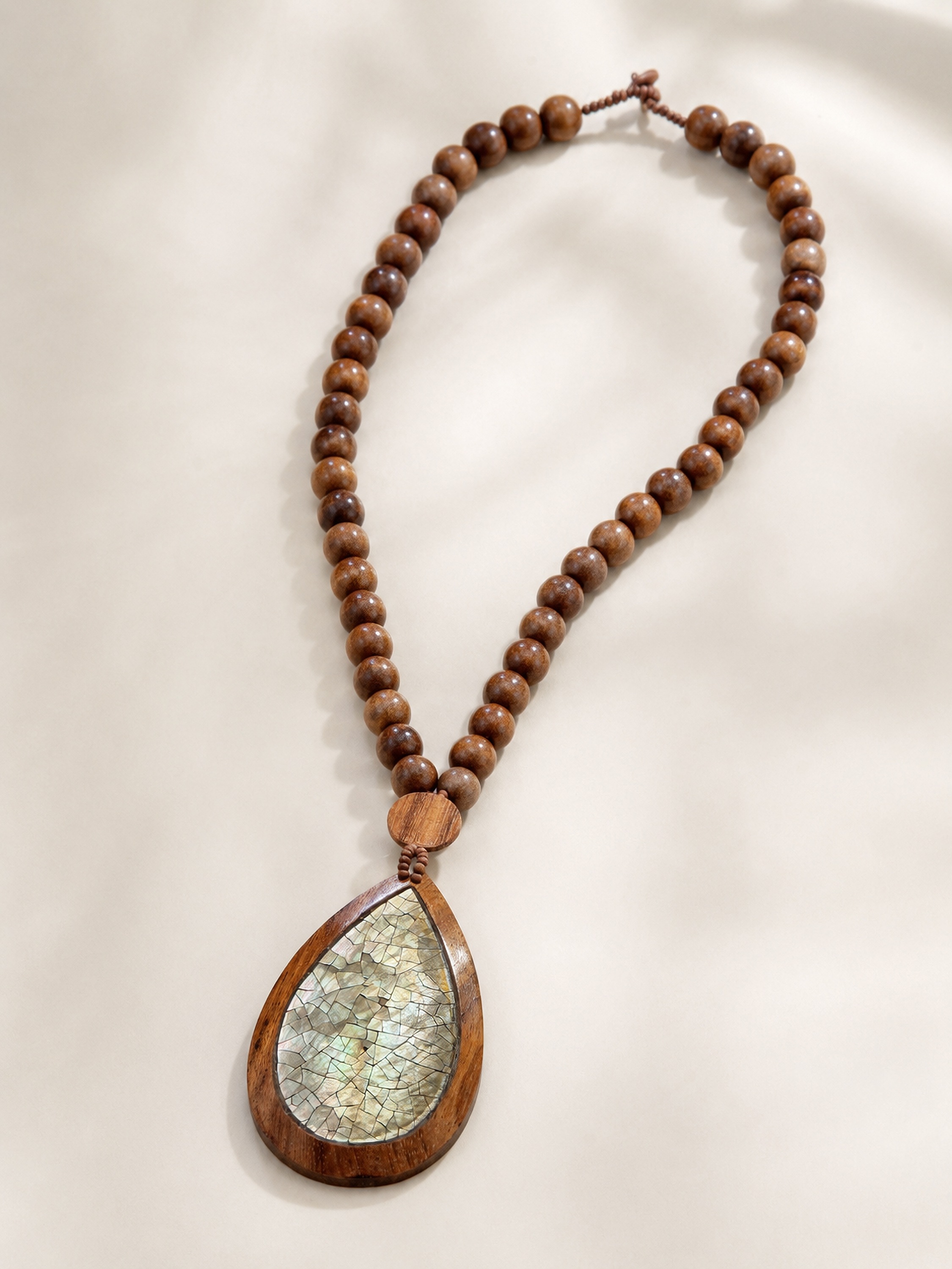 COLLEZIONE ALESSANDRO Lange Kette »Luna« aus Holz und echten Muscheln