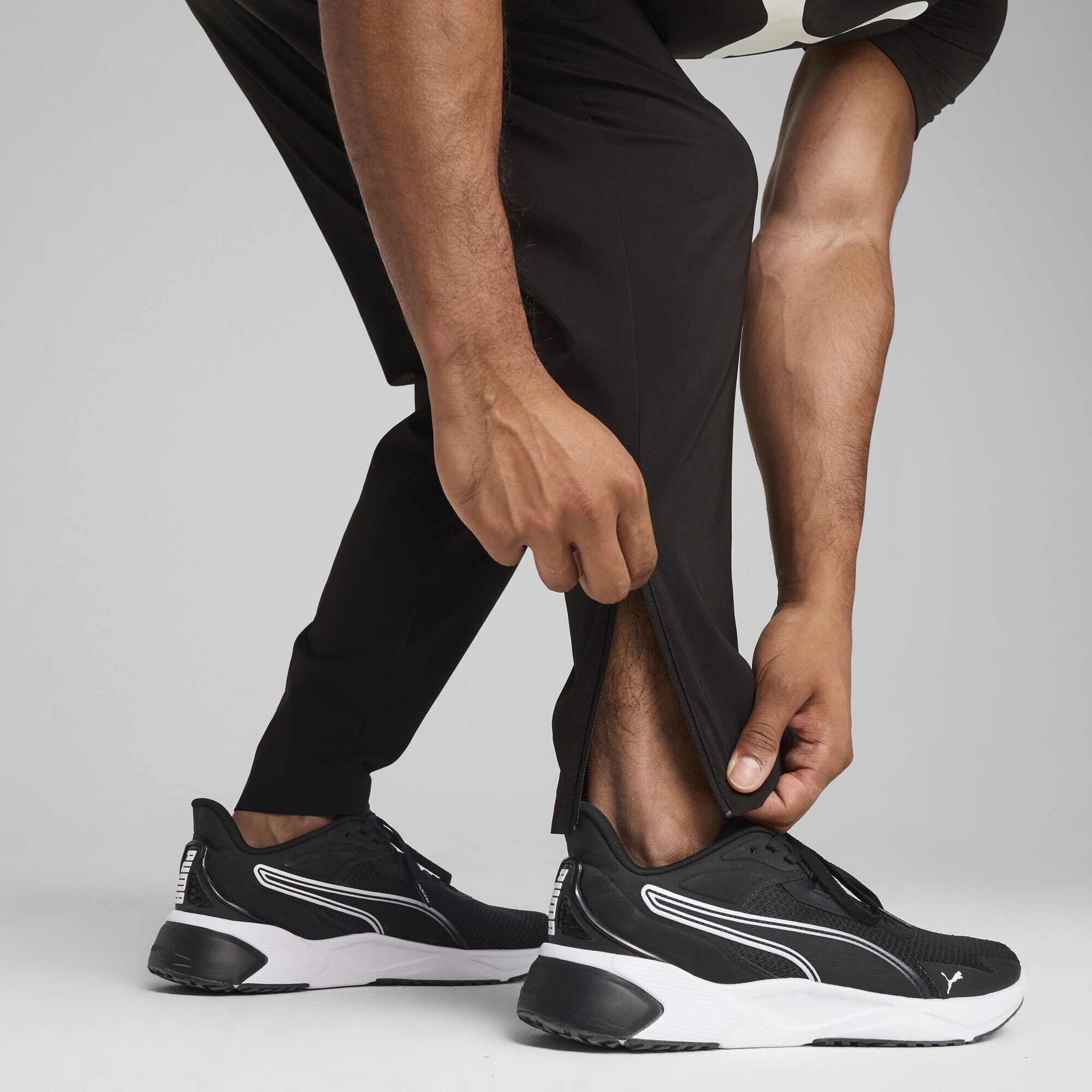 PUMA Trainingshose »TAD TECH Gewebte Cargohose Herren«