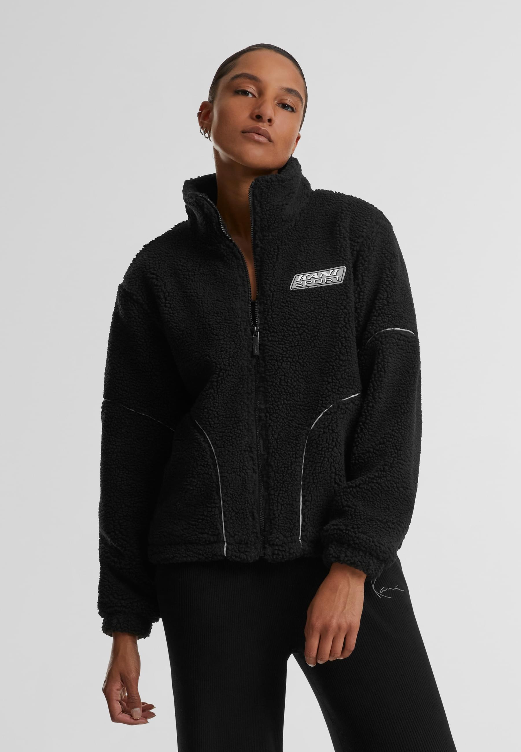 Thumbnail - Karl Kani Trainingsjacke "Karl Kani Karl Kani Sport Patch Teddy Block Trackjacket" 1 Stk. tlg. ohne Kapuze