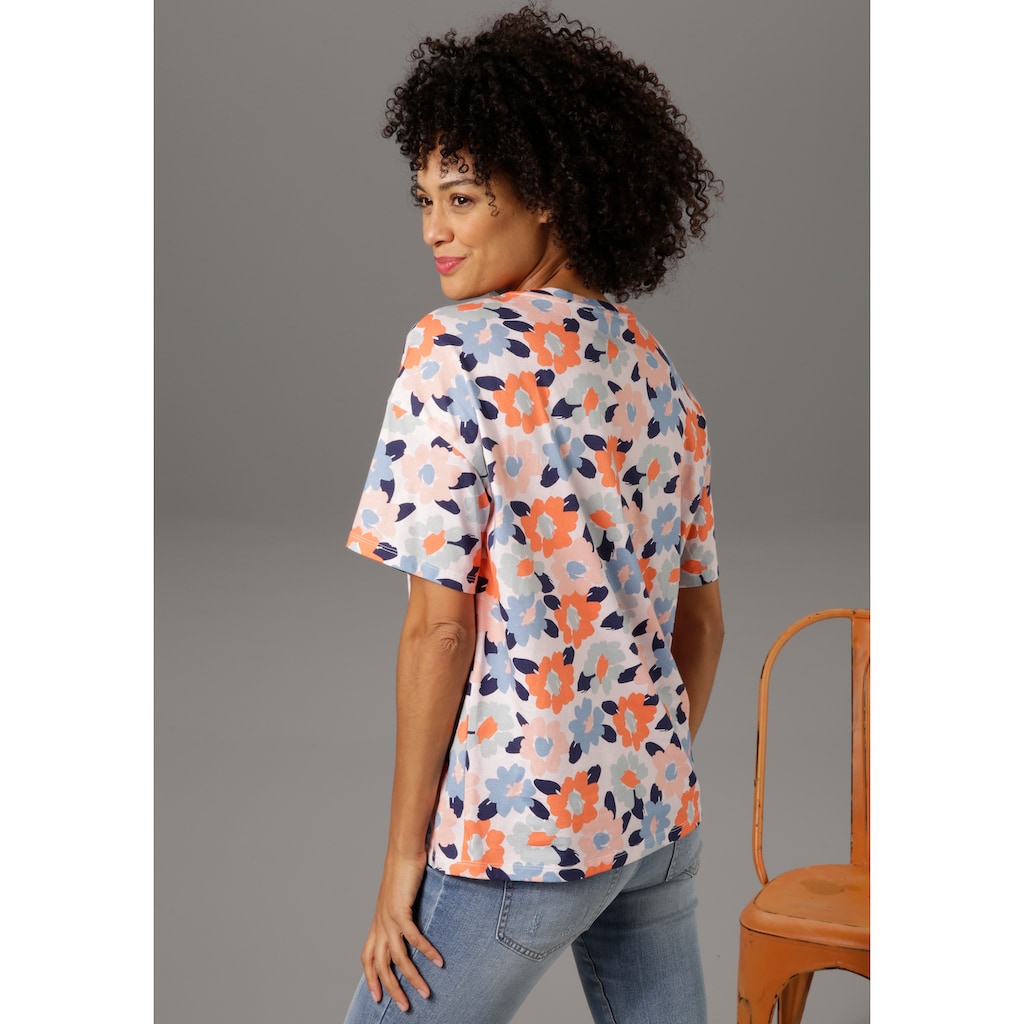 Damenmode Shirts & Sweatshirts Aniston CASUAL T-Shirt, mit farbenfrohen, graphischen Blütendruck rose-orange-rauchblau-apricot-m