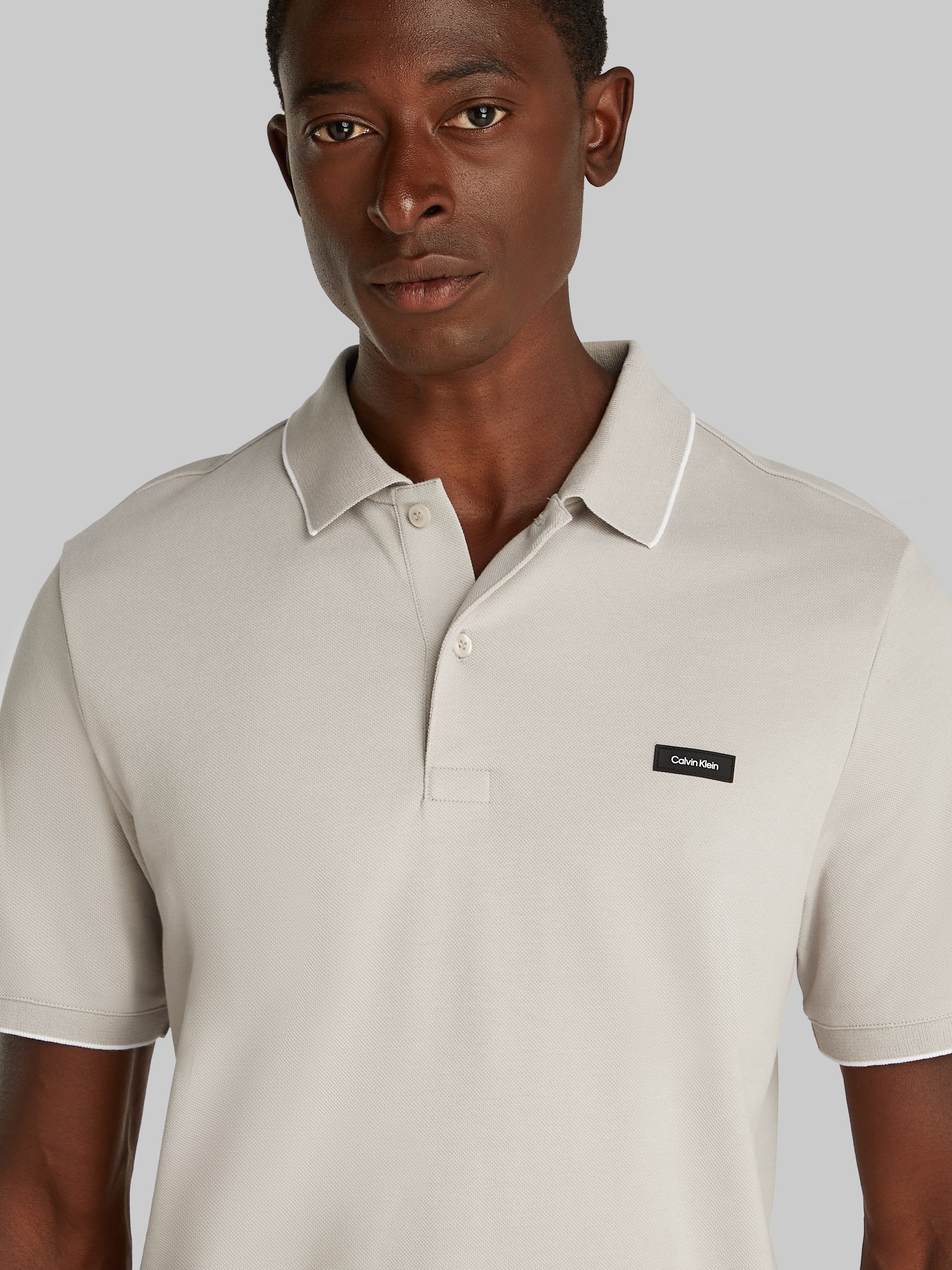 Calvin Klein Poloshirt "STRETCH PIQUE TIPPING POLO", mit Streifendetail am günstig online kaufen