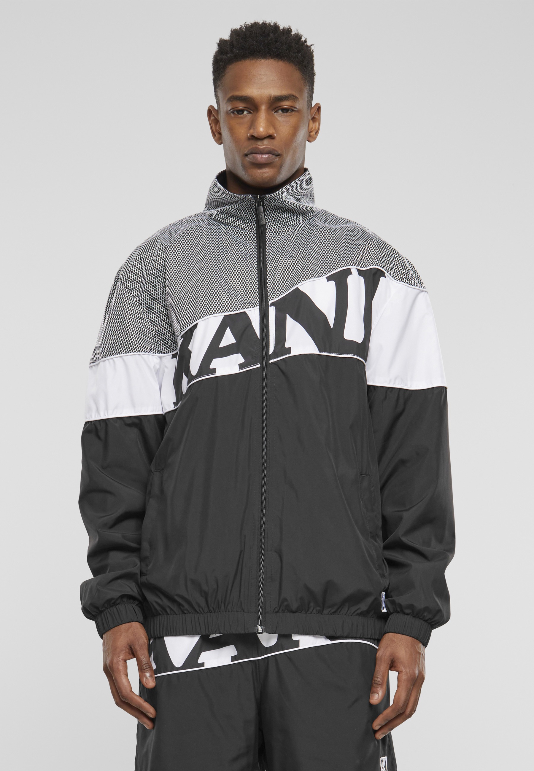 Karl Kani Trainingsjacke »Karl Kani Herren KM242-011-2 Wavy Retro Block Trackjacket« 1 Stk. tlg. ohne Kapuze