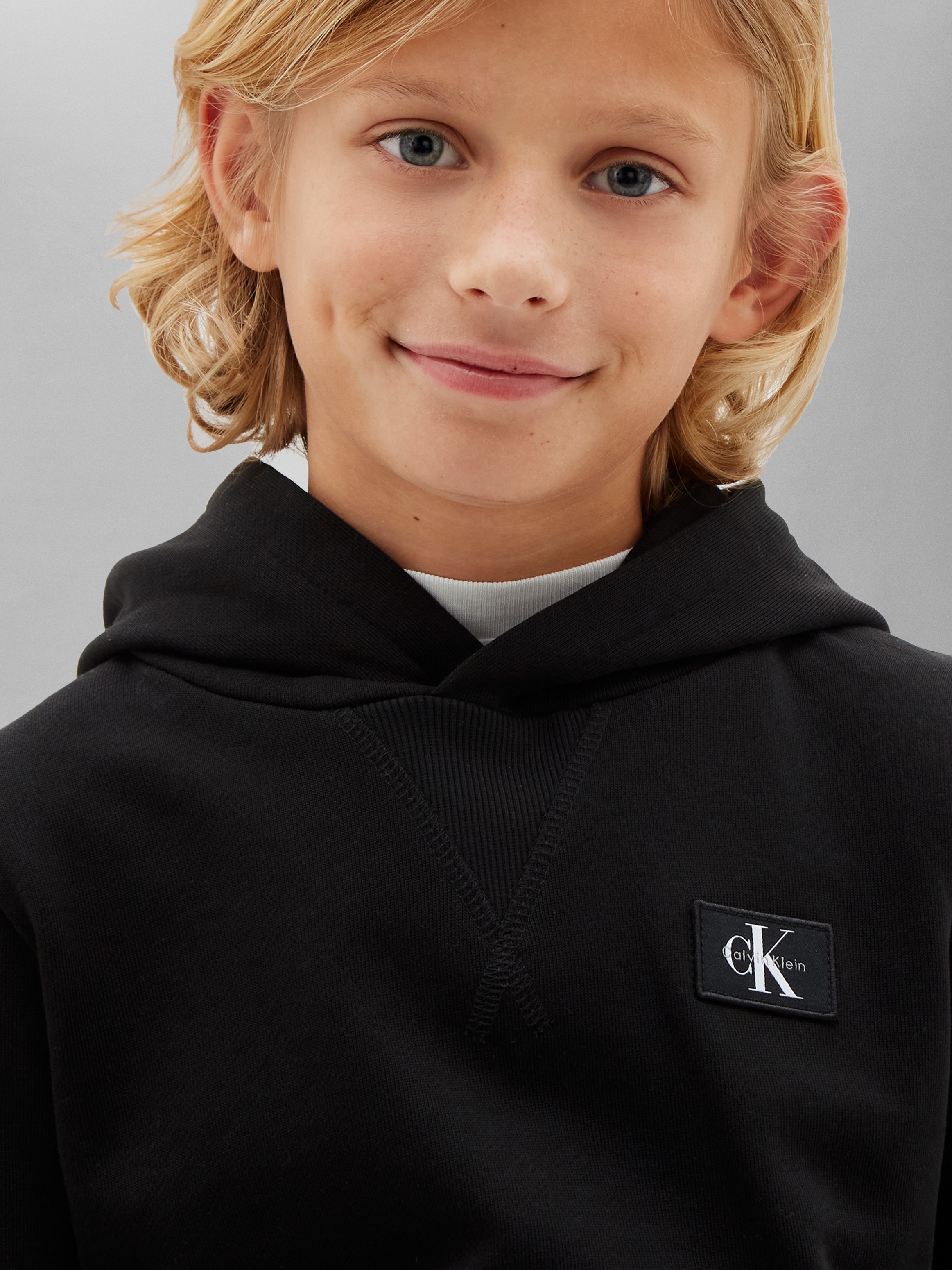 Calvin Klein Jeans Kapuzensweatshirt »TERRY CK WOVEN LABEL HOODIE«, Regular fit mit Kapuze
