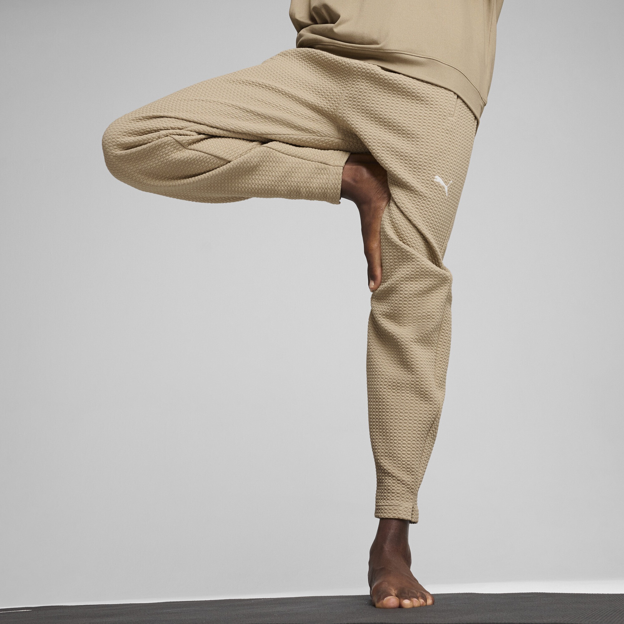 PUMA Yogahose »STUDIO Texture Hose Herren«