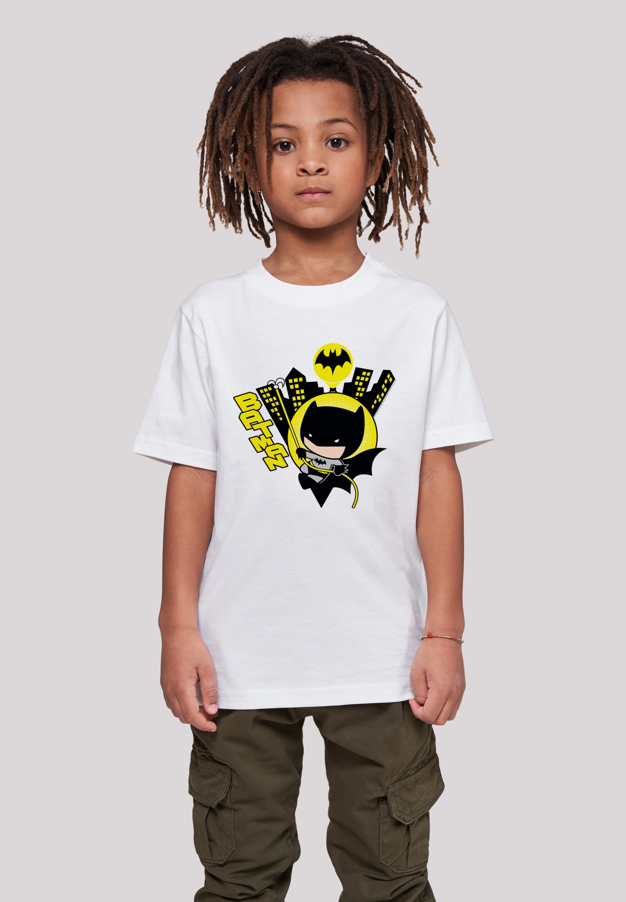 F4NT4STIC Kurzarmshirt »F4NT4STIC Kinder Chibi Batman Swinging -WHT with Kids Basic Tee«, (1 tlg.)