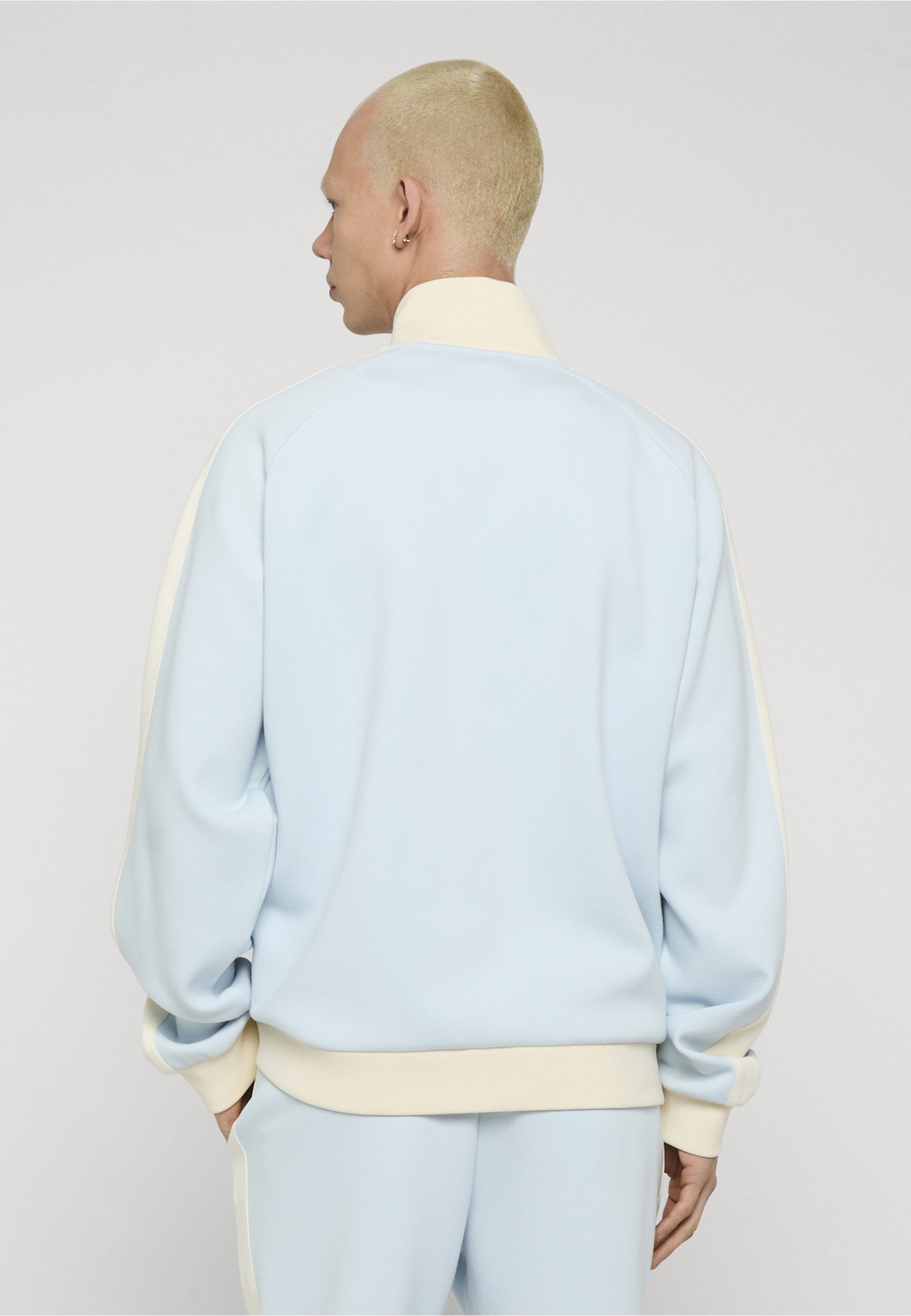 Karl Kani Outdoorjacke »Karl Kani Signature Sidestripe Pique Trackjacket« 1 Stk. tlg. ohne Kapuze