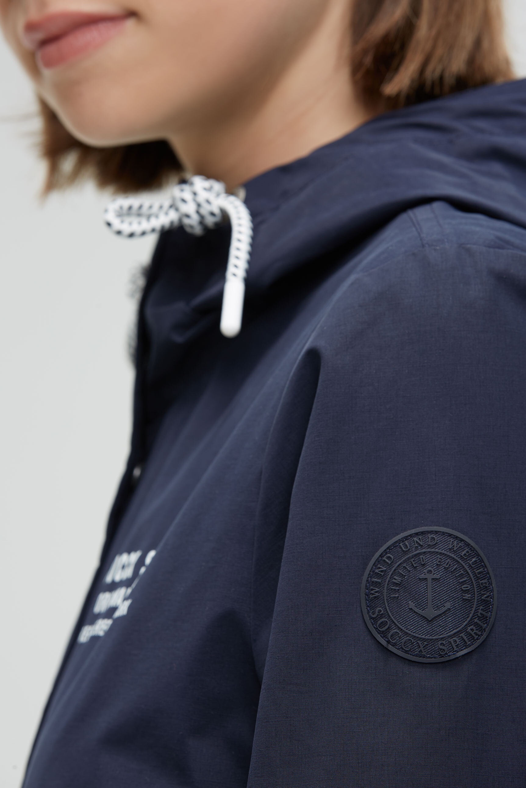 SOCCX Funktionsjacke mit Kapuze mit Windbreaker-Bündchen und Waterproof-Eingrifftaschen