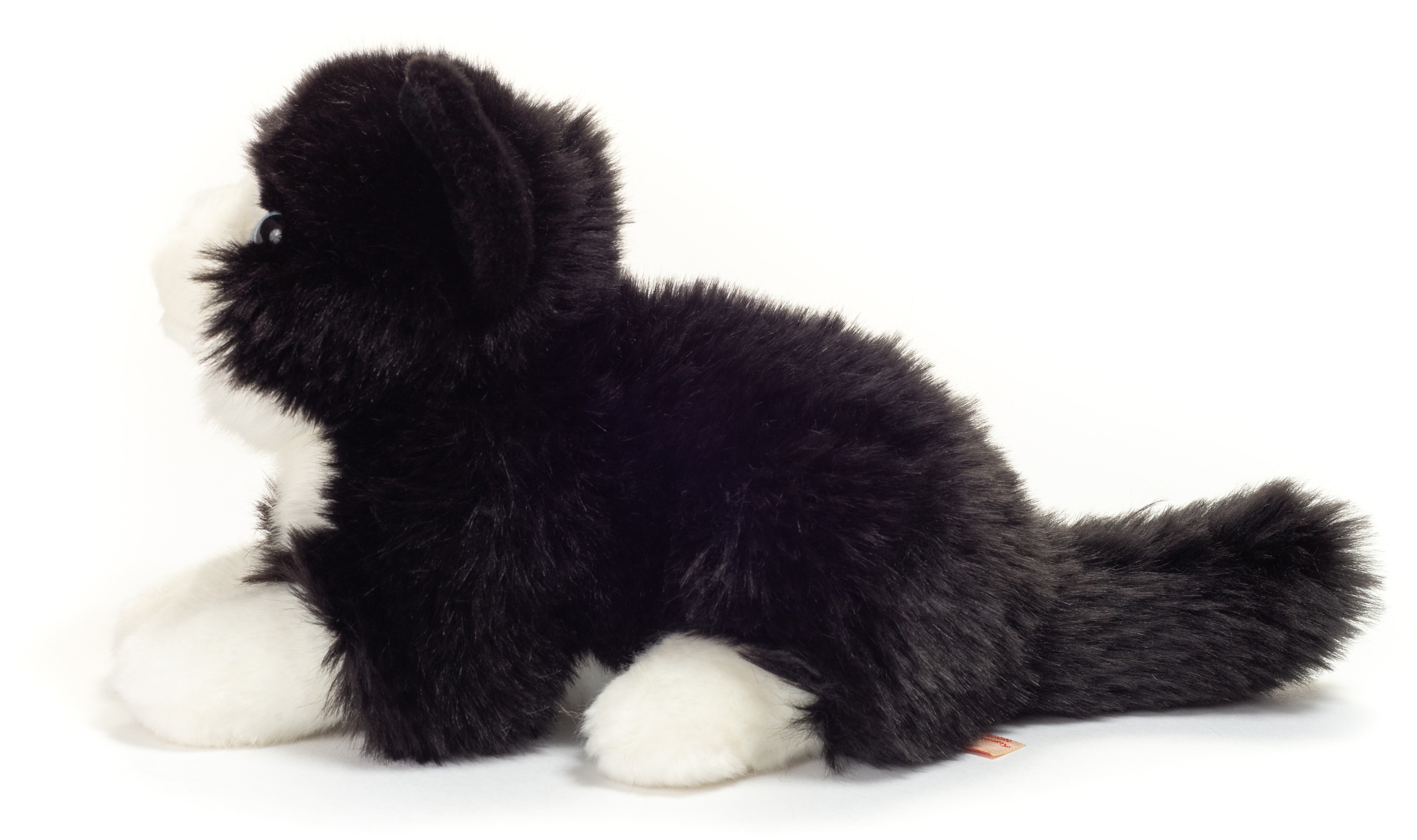 Teddy Hermann® Kuscheltier »Katze liegend schwarz/weiß, 20 cm«, zum Teil aus recyceltem Material