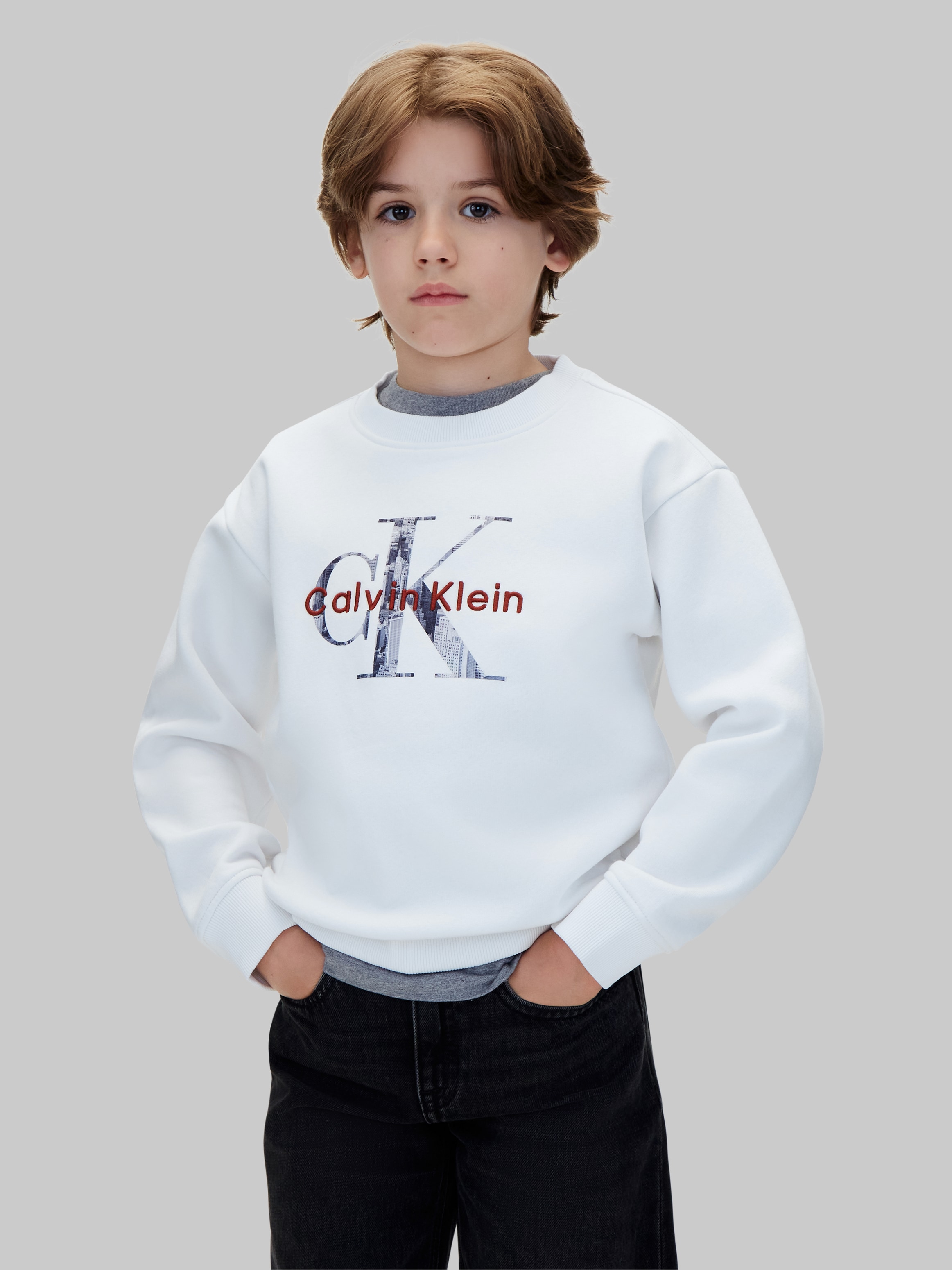 Calvin Klein Jeans Sweatshirt "FILLED MONOLOGO CN SWEATSHIRT", Regular fit mit Rundhalsausschnitt, Logoschriftzug