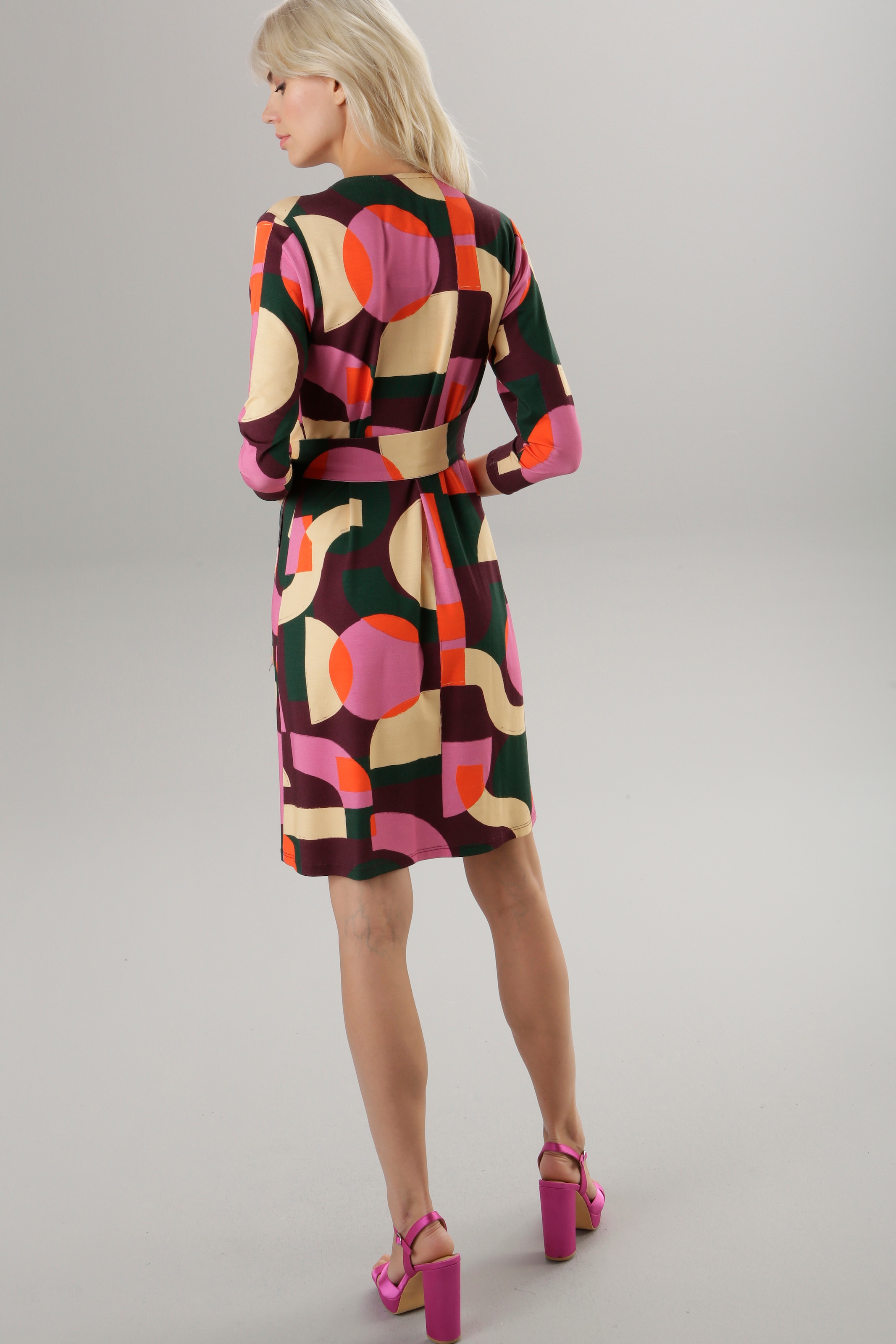 Aniston für Jerseykleid, bestellen und - BAUR in SELECTED NEUE | Wickeloptik mit KOLLEKTION Bindedetail Ausschnitt