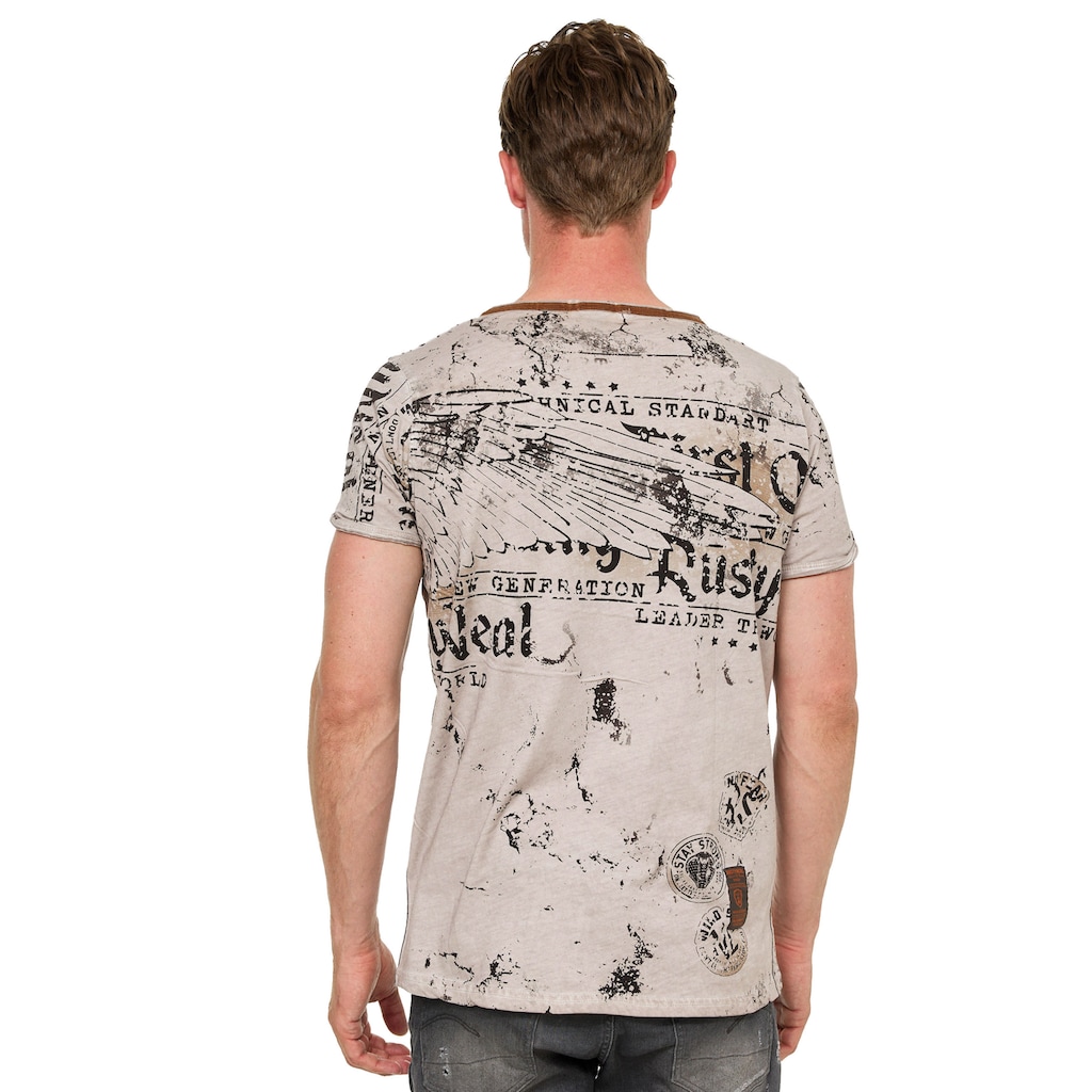 Rusty Neal T-Shirt mit Allover-Druck GE6573