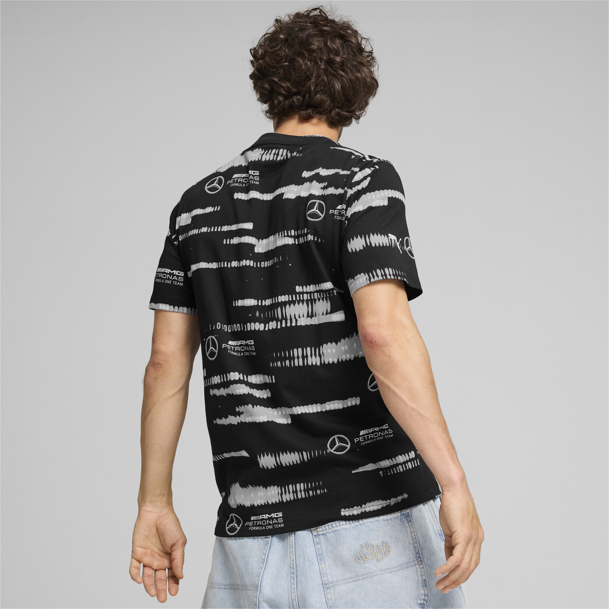 PUMA T-Shirt »Mercedes-AMG Petronas F1® Logo T-Shirt mit Allover-Print Herren«