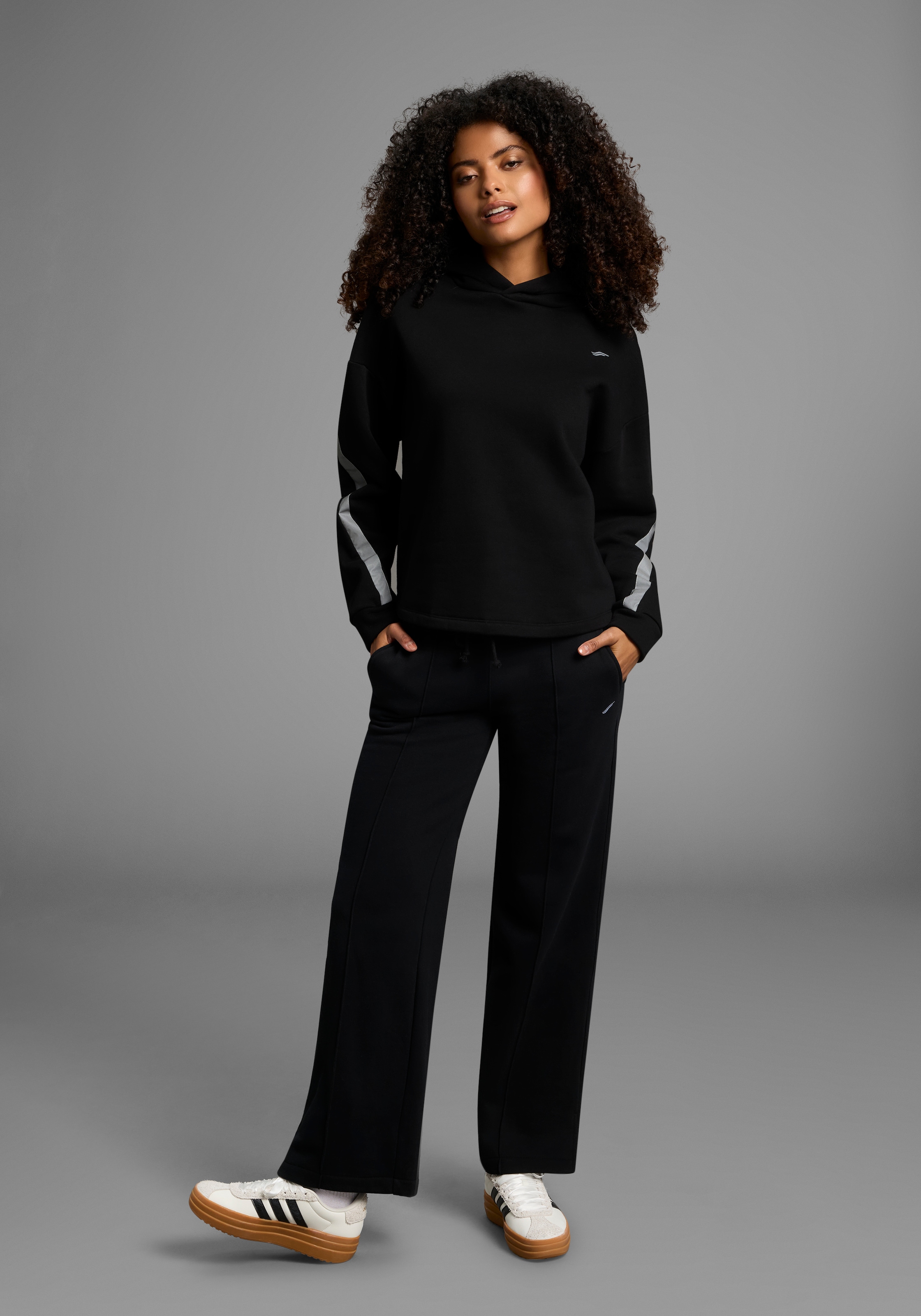 FAYN SPORTS Kapuzensweatshirt, Weiches oversized Sweatshirt mit Reflektorstreifen und Kapuze.