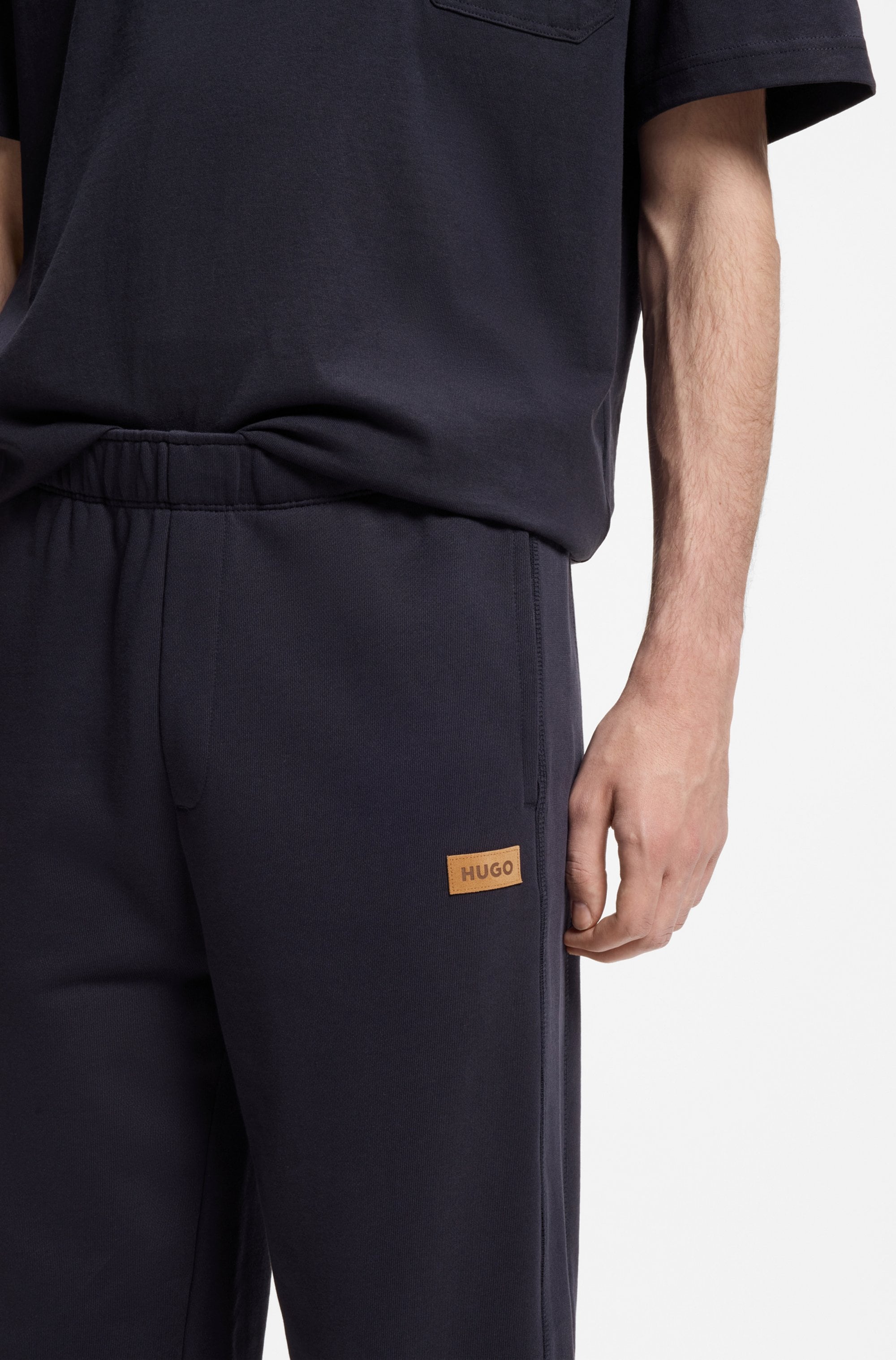 HUGO Sweathose »Nevatro«  Regular Fit, Zierhosenschlitz, elastische Bündchen