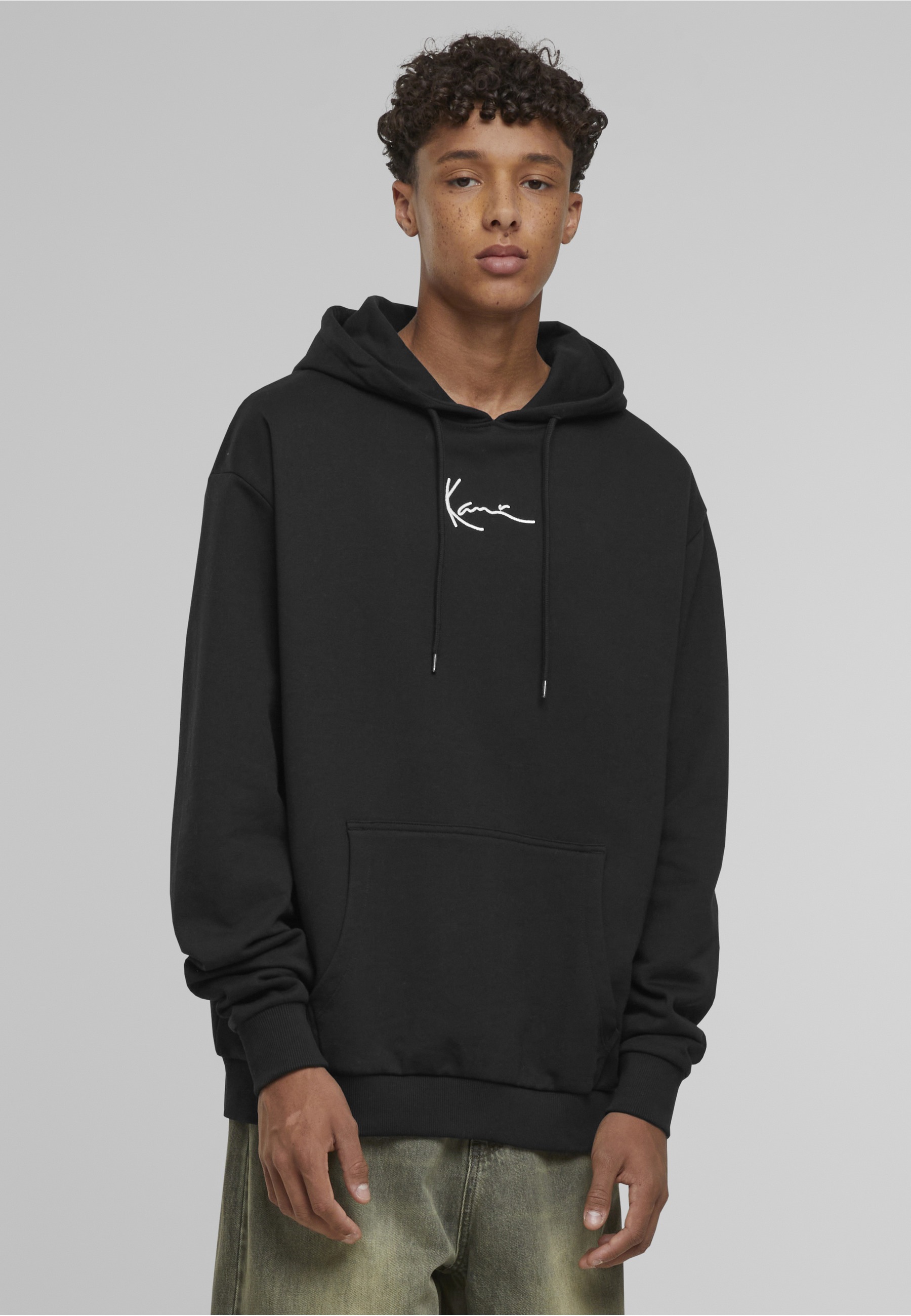 Thumbnail - Karl Kani Kapuzenpullover "Karl Kani Small Signature Glow Logo Hoodie" 1 Stk.