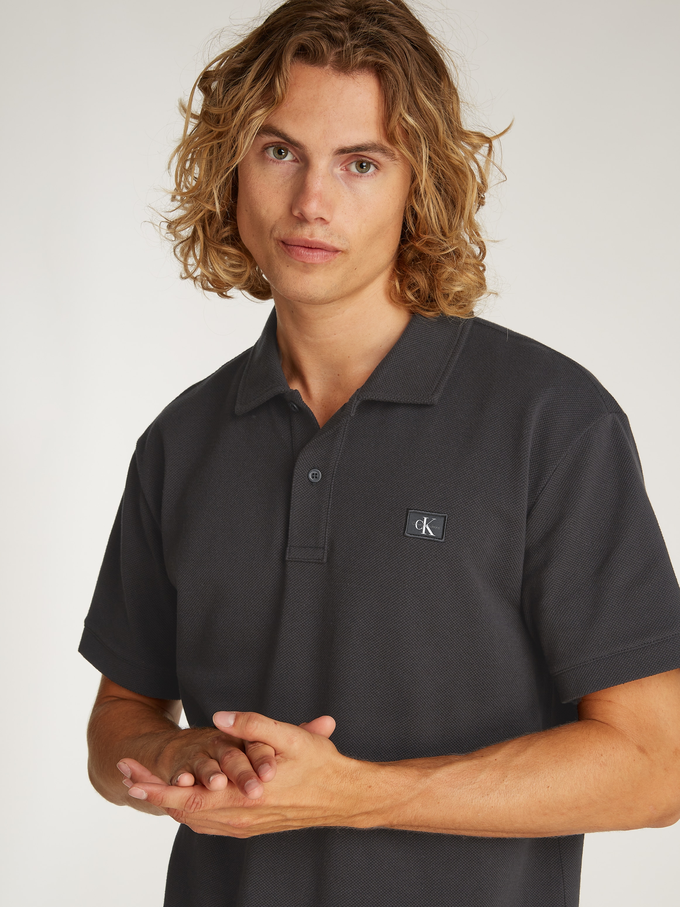 Calvin Klein Jeans Poloshirt »WOVEN LABEL POLO«, Logodruck