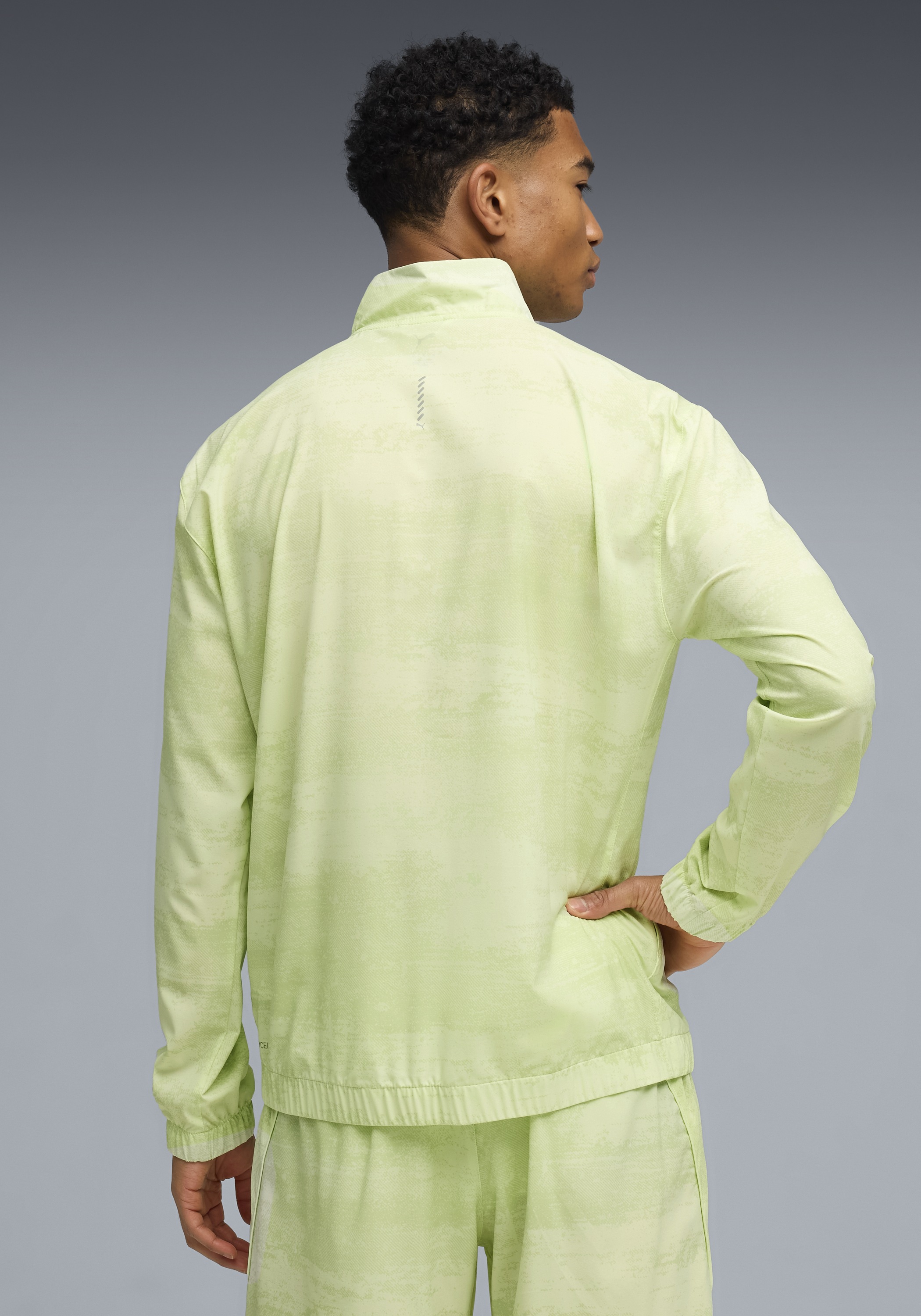 PUMA Trainingsjacke "M RUN VELOCITY AOP WOVEN JACKET" ohne Kapuze mit Reißv günstig online kaufen