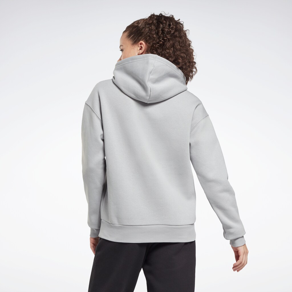 Damenmode Shirts & Sweatshirts Reebok Sweatshirt »TRAINING ESSENTIALS VECTOR HOODIE« grau Damenmode Shirts & Sweatshirts Reebok Sweatshirt »TRAINING ESSENTIALS VECTOR HOODIE« grau