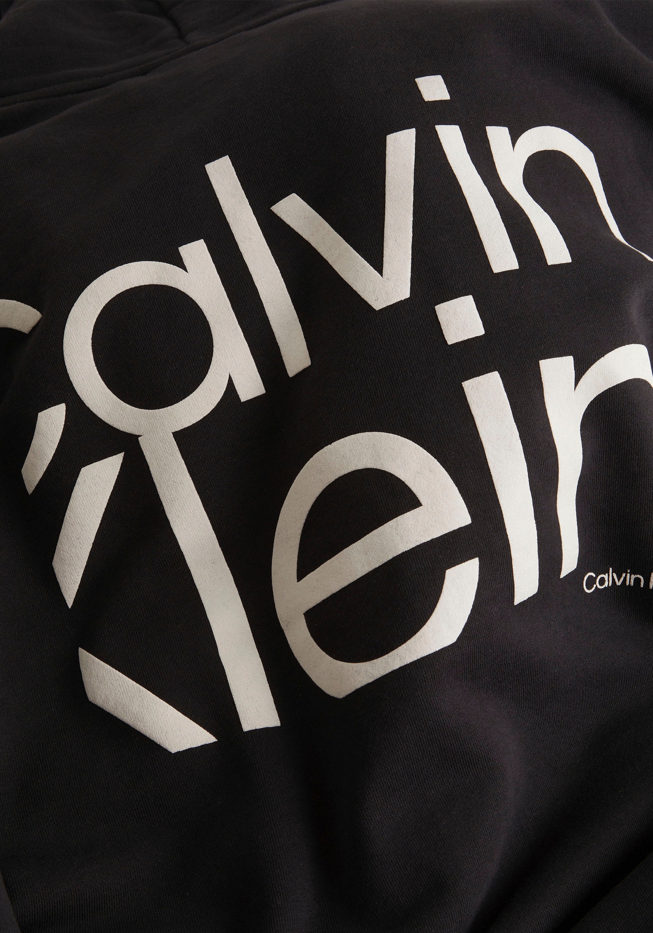 Calvin Klein mit großem ▷ Kapuzensweatshirt, BAUR Rücken auf dem für | CK-Schriftzug