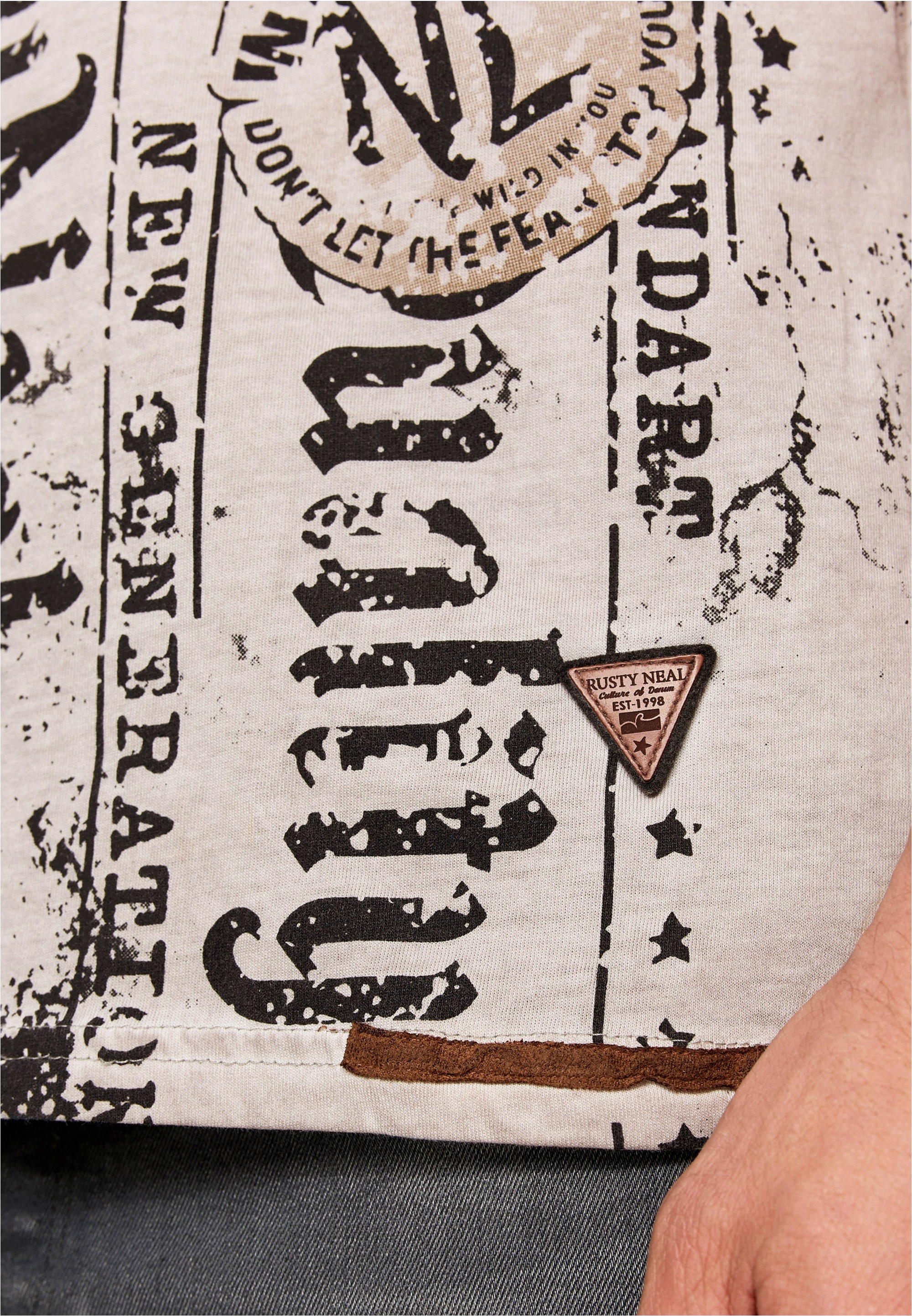 Rusty Neal T-Shirt, mit Allover-Druck