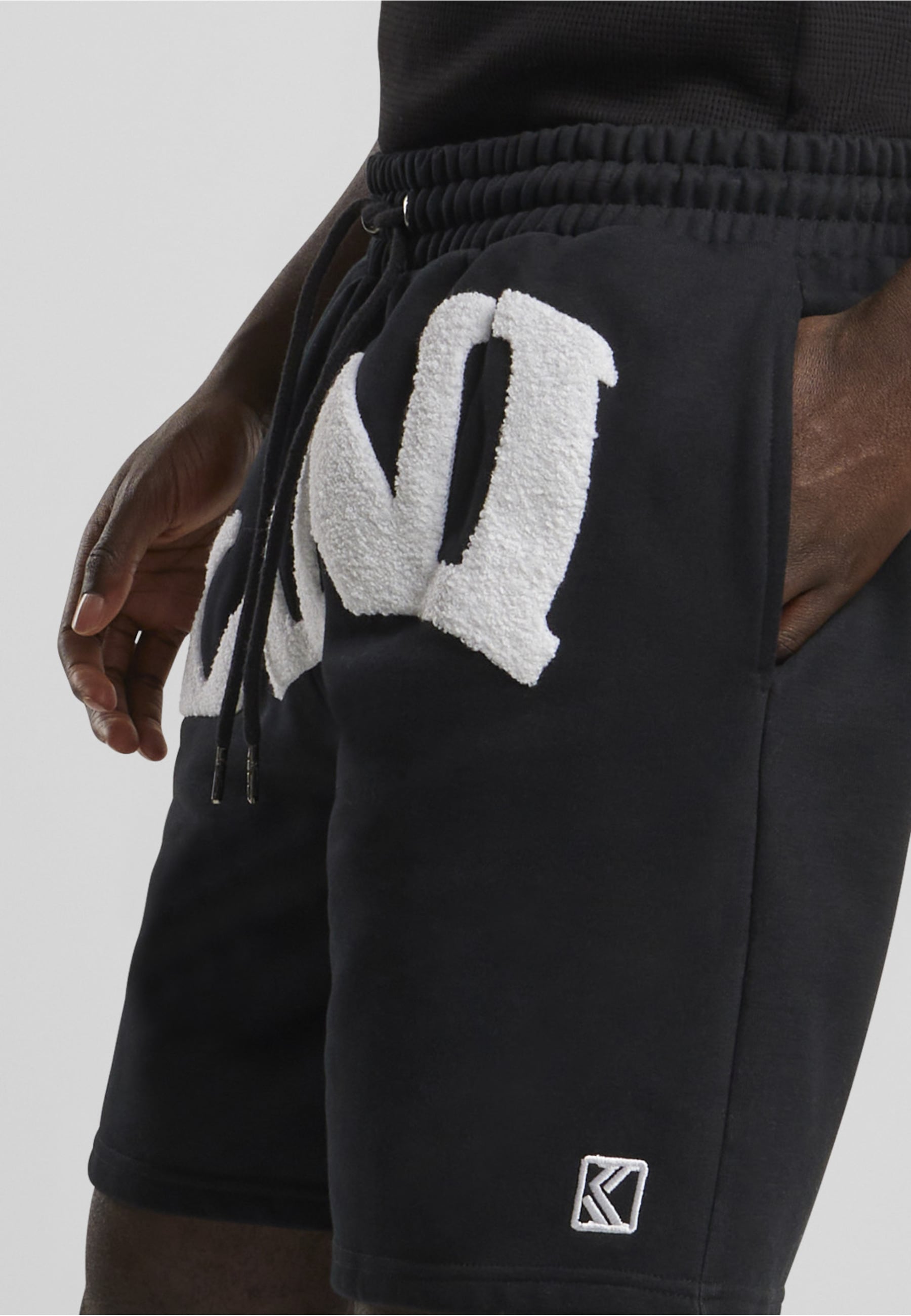 Karl Kani Shorts »Karl Kani Herren KK Wavy Retro Sweatpants«