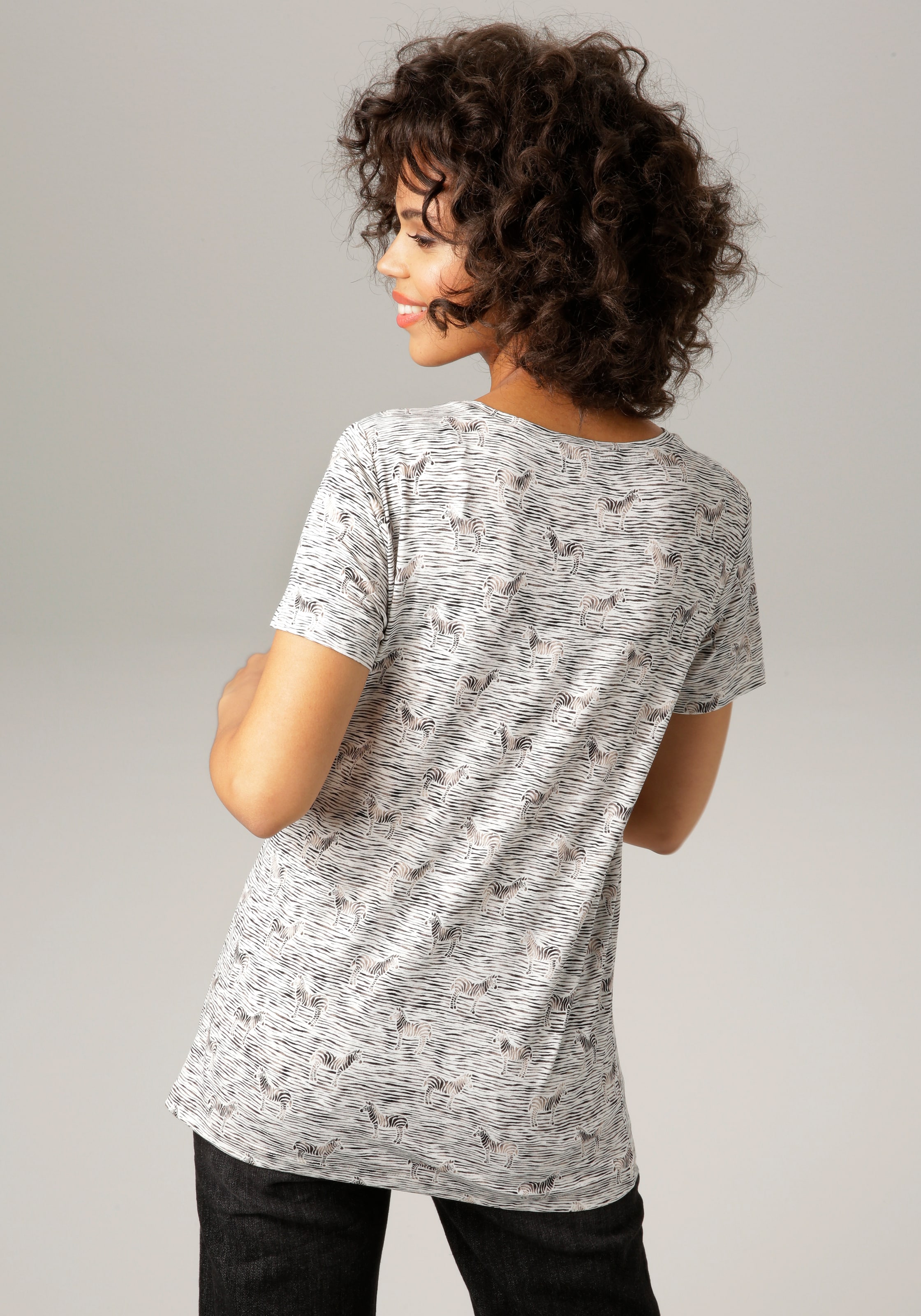 Aniston CASUAL T-Shirt, leicht schimmernder Druck mit Zebras und Streifen  bestellen | BAUR